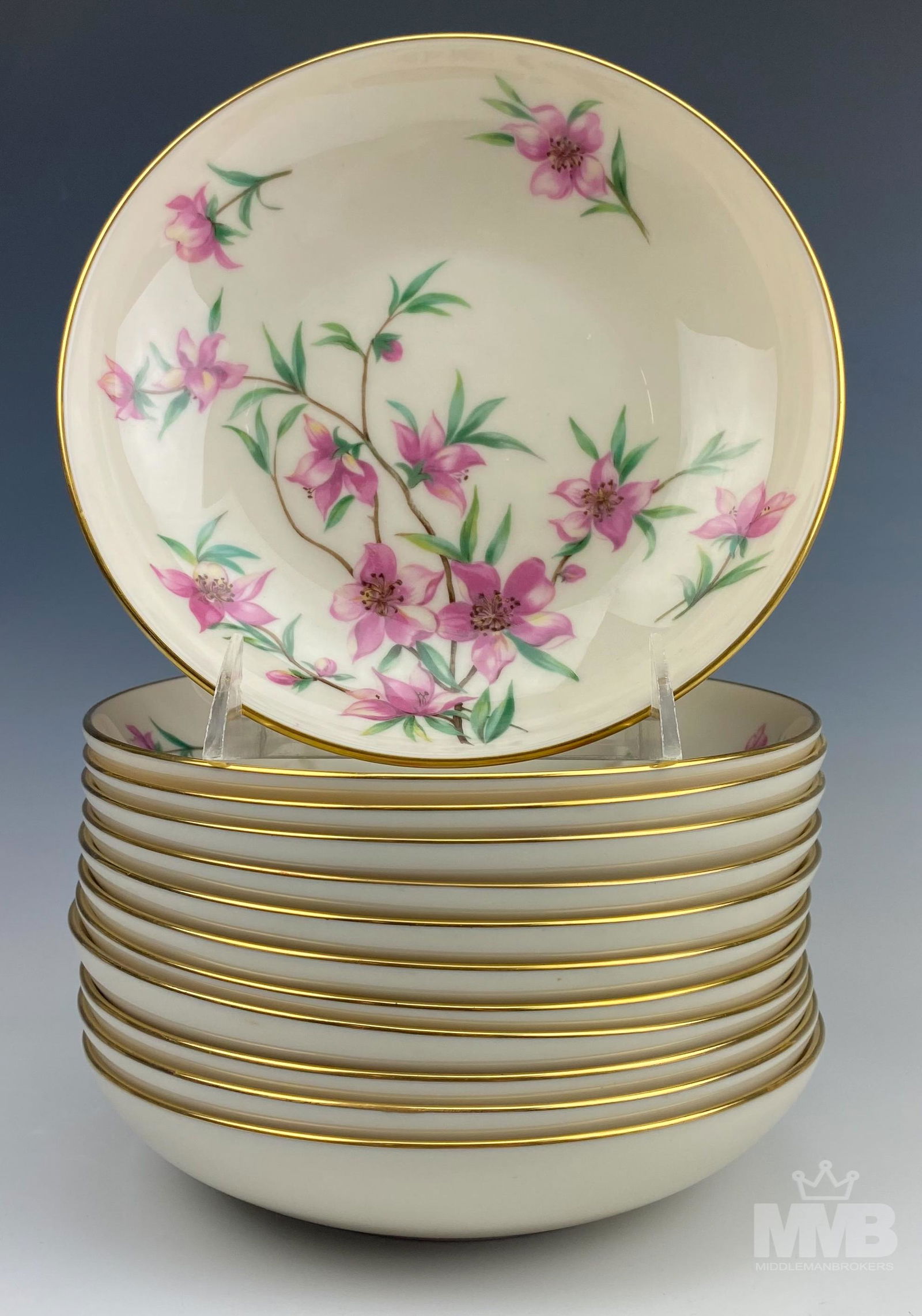 12 Lenox Porcelain Peachtree Coupe Soup Bowl Set: 12 Lenox Peachtree soup bowls. Bowls are of creme color with pink floral design and gold plated trim. Good overall condition with mild storage wear. Measures approximately 7.25 in. x 7.25 in x 1.5 in.
