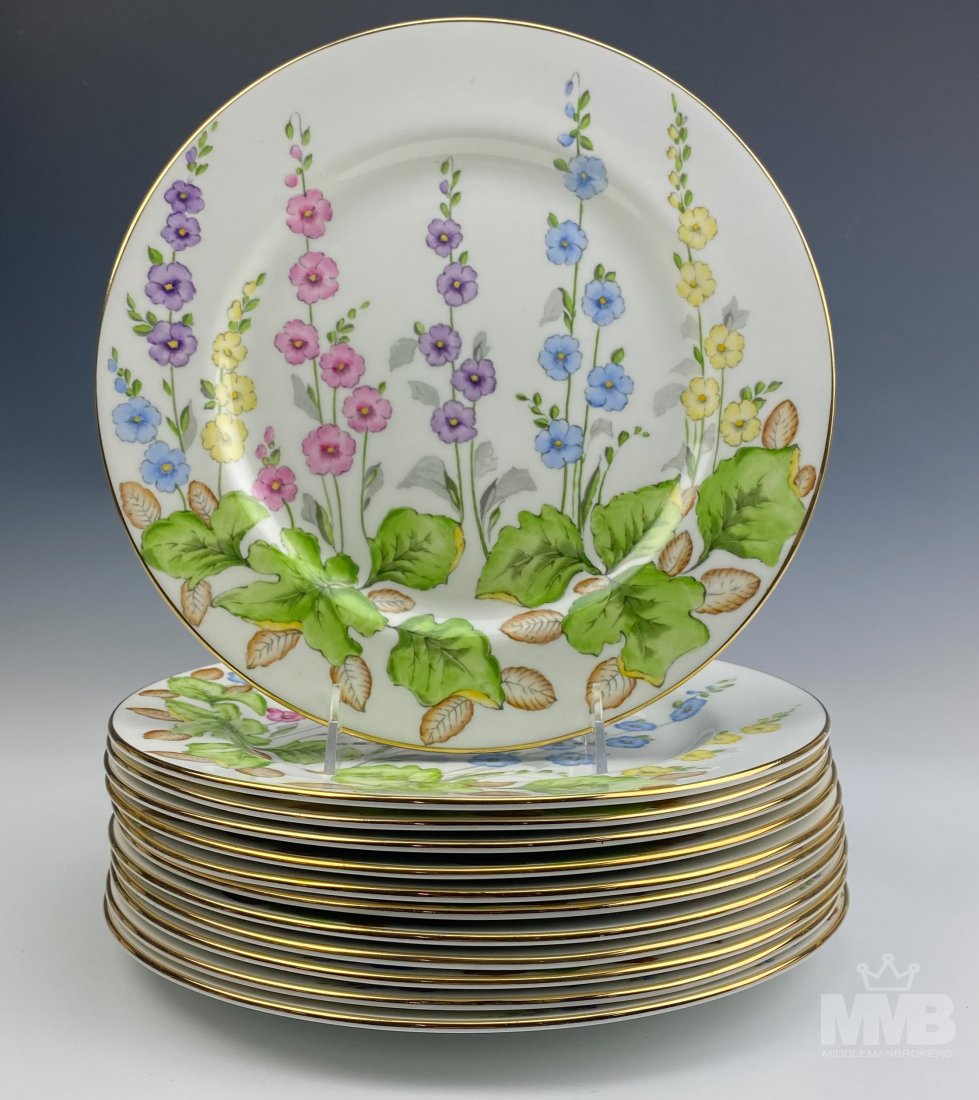 10 Hammersley & Co Bone China Floral Salad Plates: Set of Neiman-Marcus Hammersley & Co bone china salad plates. Features floral design on an ivory white plate with a gold trim. Marked on verso. Good overall condition with mild storage wear. Measures
