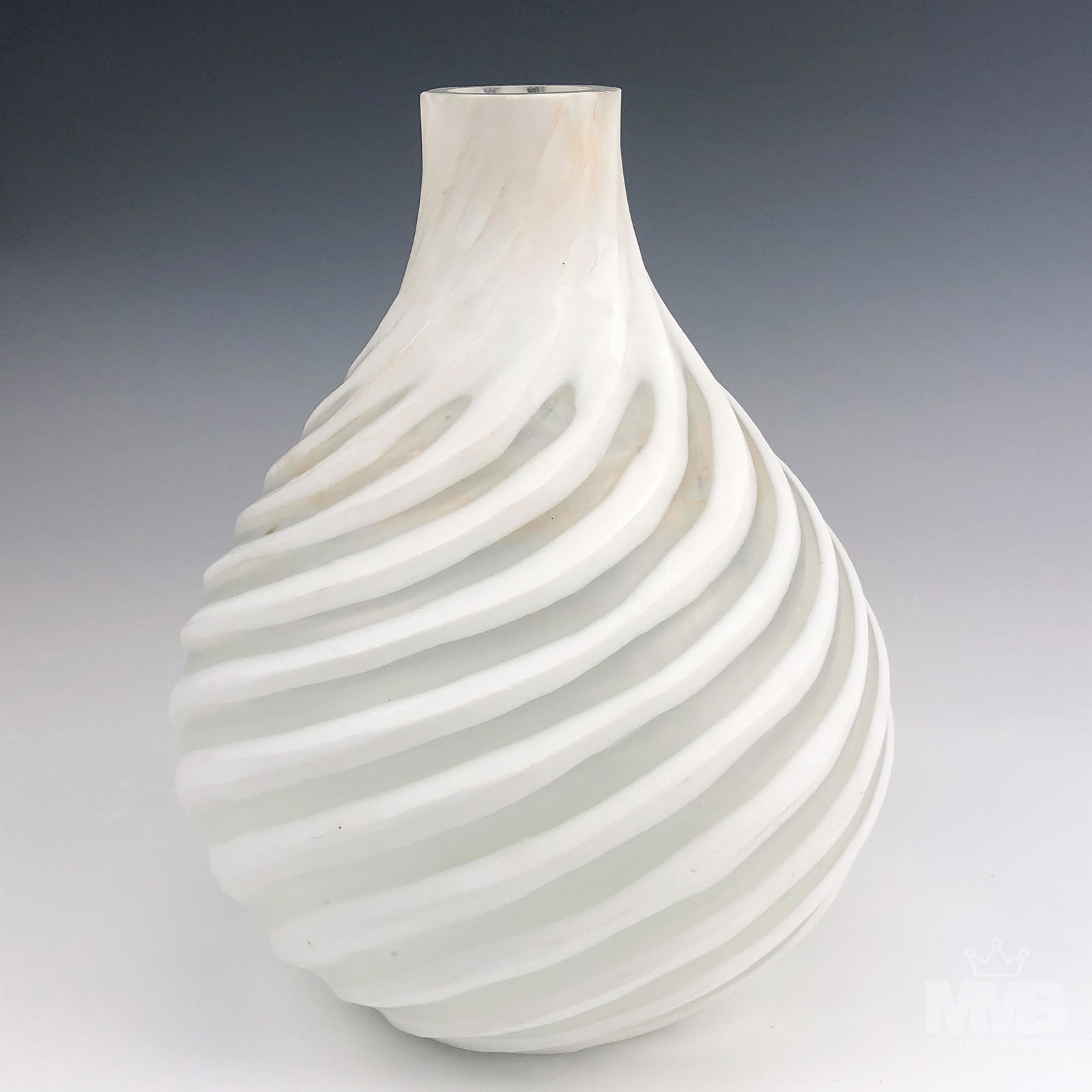 Oggetti Murano Italian White Art Glass Swirl Vase: Oggetti vase. White swirl textured pattern. Oggetti sticker on bottom. Good overall condition with mild storage wear. Measures approximately 8 3/4 in. x 7 in. x 7 in. MMB in house USA continental ship