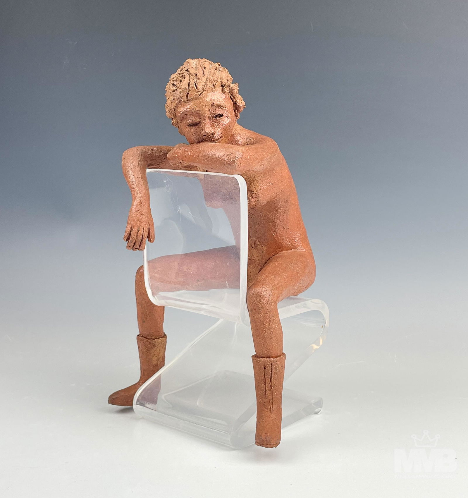 Nude Pottery Zigzag Chair Sculpture after Rietveld: Features a seated figural nude woman on acrylic lucite zig zag chair. This iconic minimalistic "no legs" chair was originally designed in 1934 by Gerrit Thomas Rietveld. The nude is removable. Good co