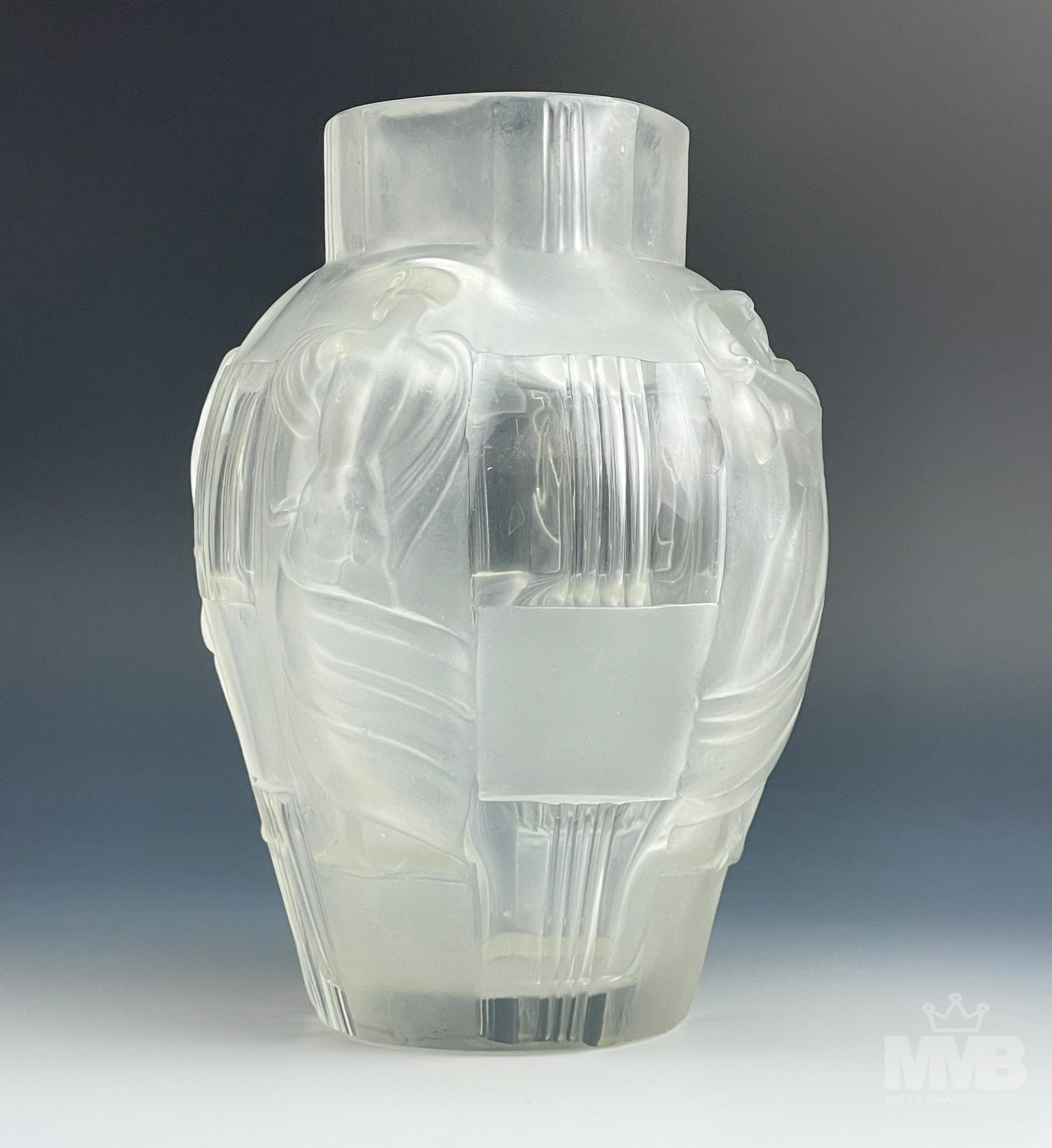 Bohemian Czech Art Deco Frosted Crystal Glass Vase: Features a frosted crystal art glass vase of European modeled and designed in the manner of Lalique. 4 raised partially nude slender maidens with flowing robes grace the body with vertical ribbed line