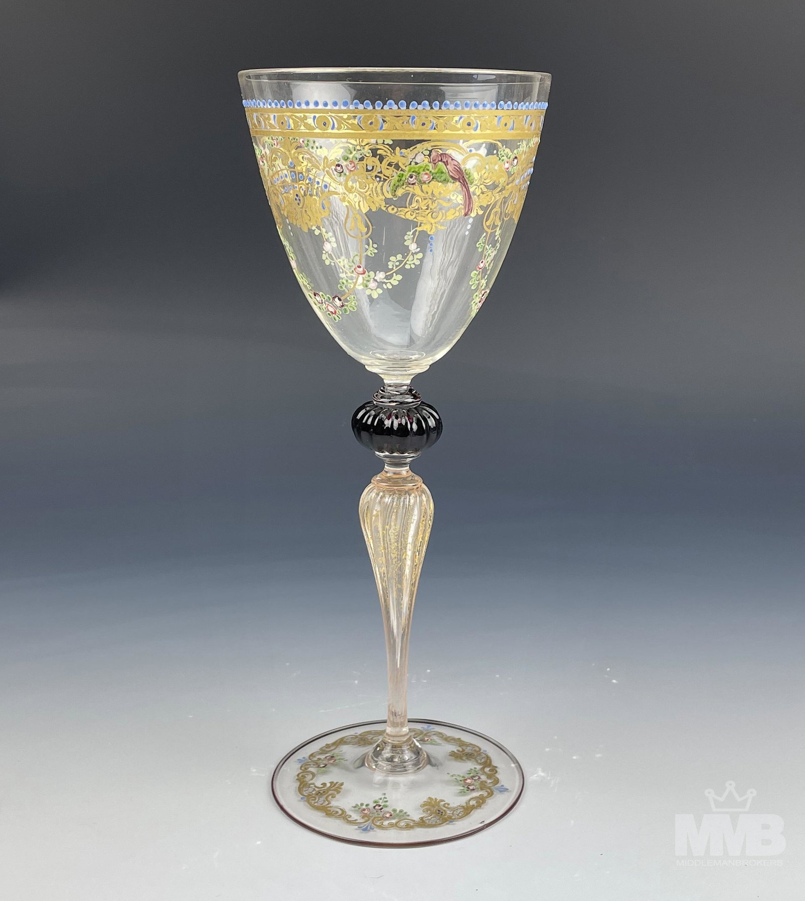 Antique Salviati Venetian Moser Glass Wine Goblet: Early 20th Century hand blown Salviati Venetian glass wine goblet decorated by the famous Moser factory in Bohemia. Graced with gold gilt decorations, colorful roses and birds. Internal cased gold dus