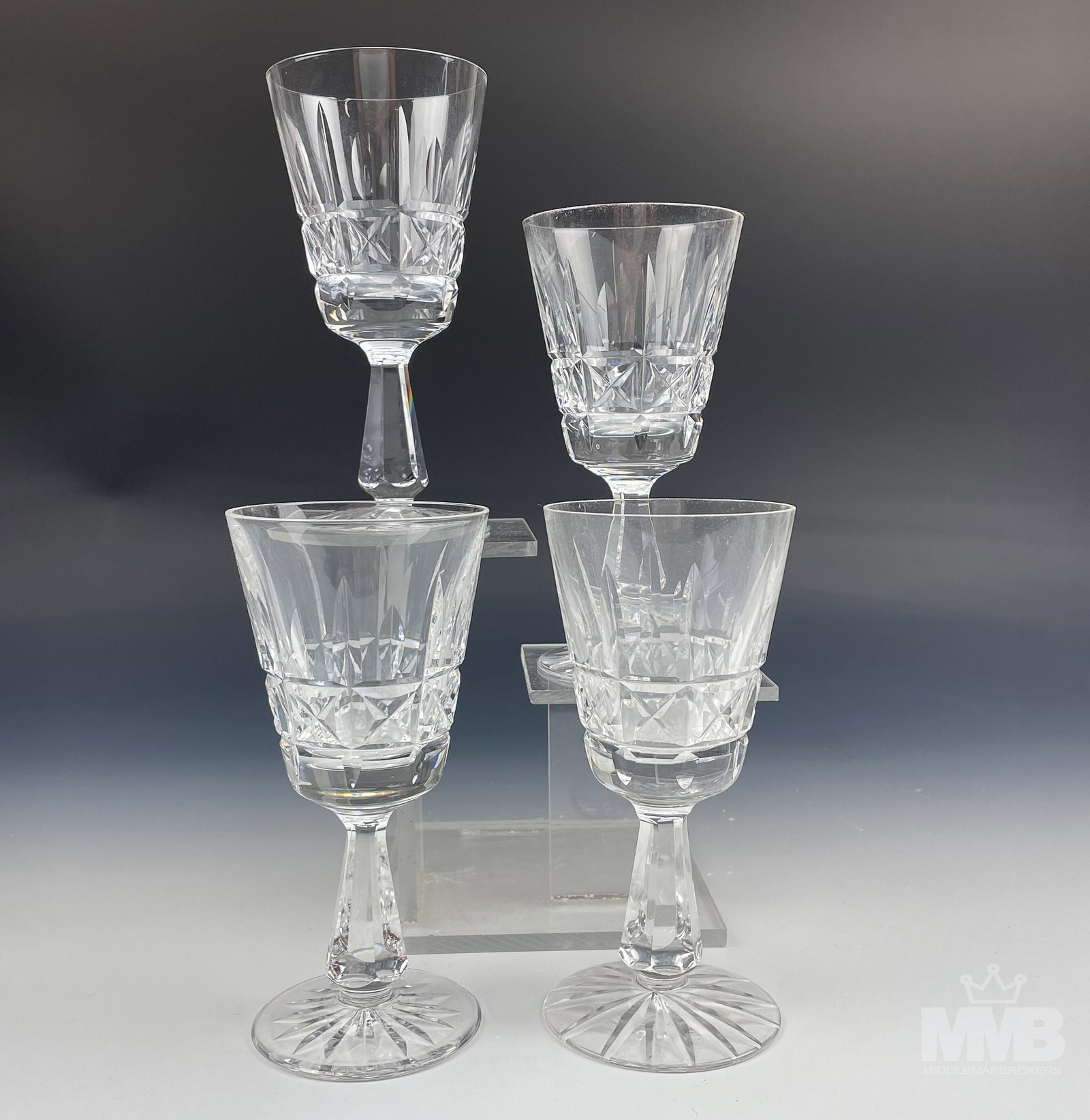 4 Waterford Crystal Kylemore Claret Wine Goblets: Up for auction are a set of 4 Waterford Ireland Irish cut crystal bar barware claret wine goblets. Modeled in their "Kylemore" pattern which was introduced in 1966. Discontinued / retired in 2017. Des