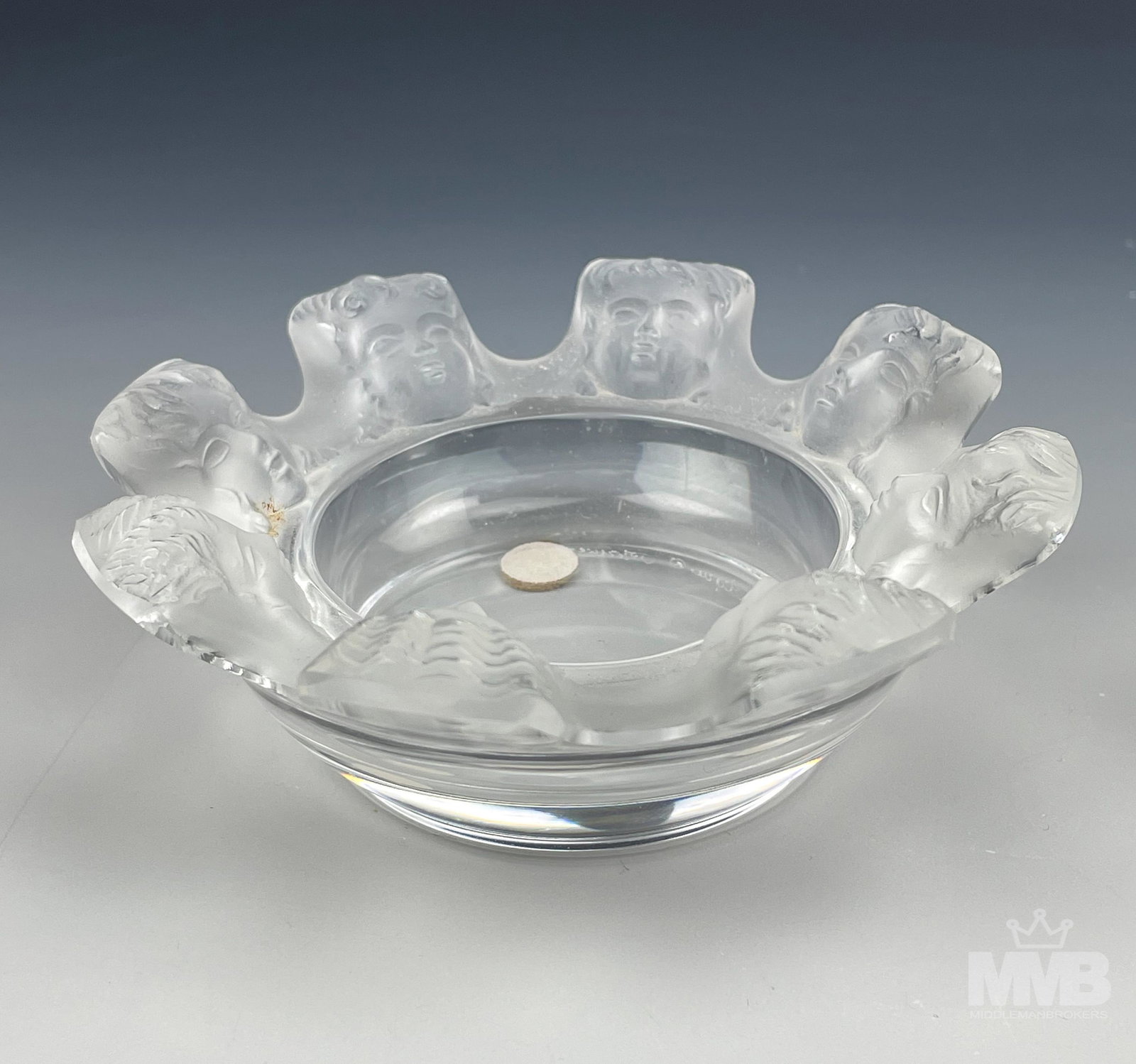 Lalique Crystal St Nicholas Frosted Cherub Ashtray: Features a Lalique France French Crystal Art Glass Ashtray Dish Bowl. Modeled in their "Saint Nicholas" pattern. Graced with 8 frosted cherub angel faces around the border, the body with a smooth high