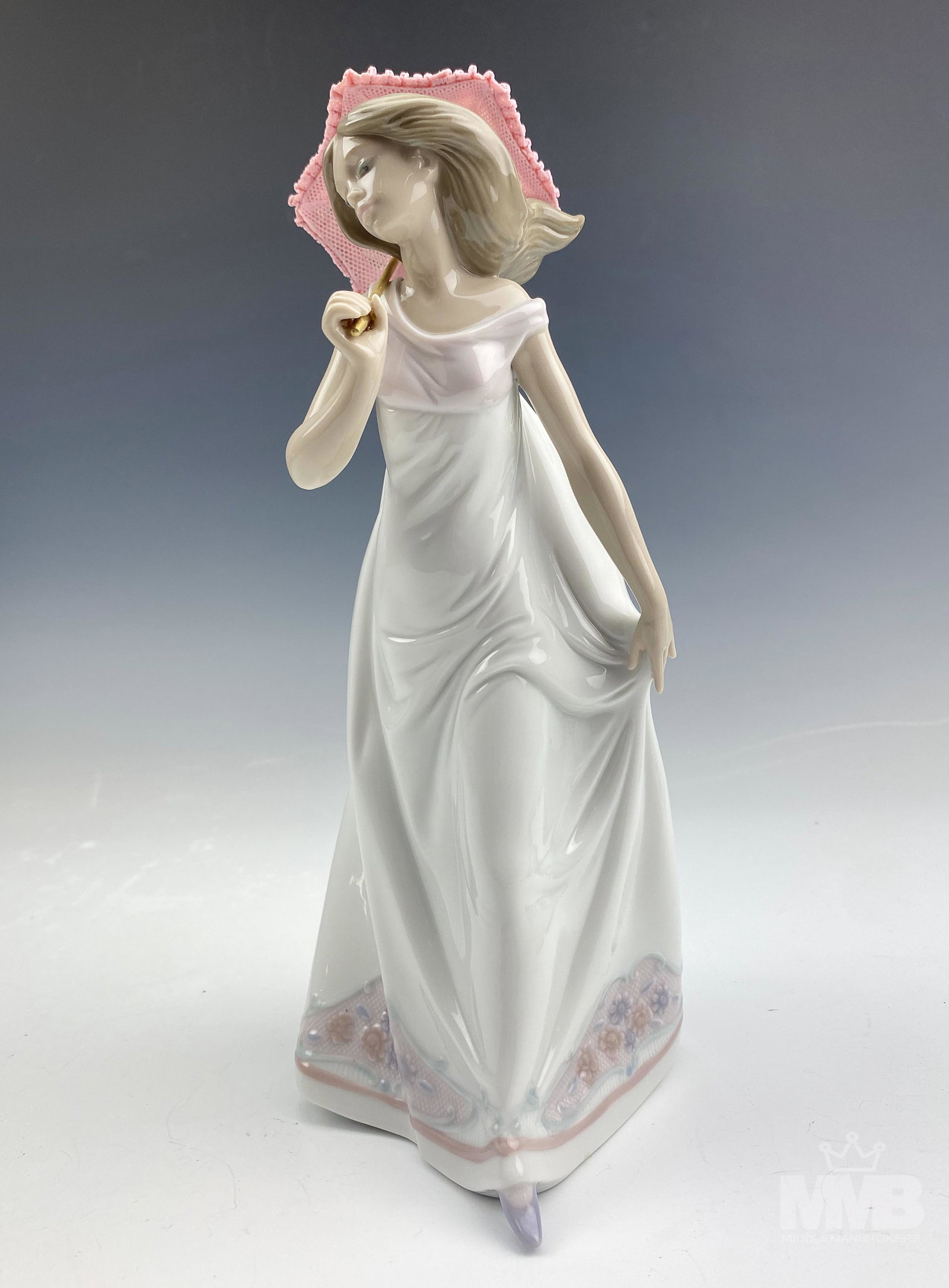 Lladro Afternoon Promenade 7636 Porcelain Figurine: Lladro Spain "Afternoon Promenade" Model Number 7636 Hand Painted Glazed Signed Porcelain Figurine. Designed by sculptor Jose Puche in 1995. Retired in 1995. Features a young girl win a flowing gown s