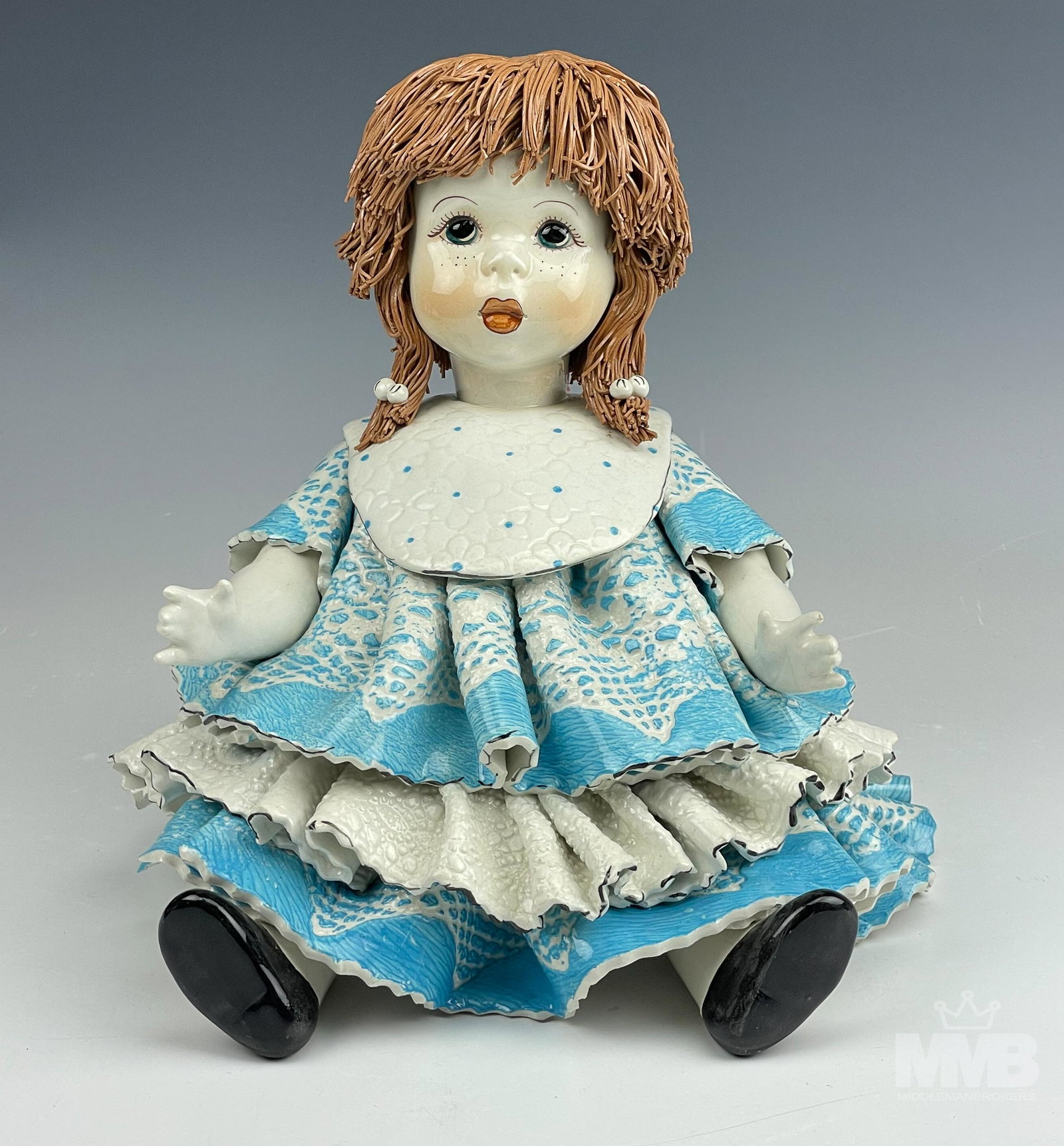 Zampiva Spaghetti Hair Ceramic Girl Doll Figurine: Lino Zampiva Italian Mid Century Modern Studio Hand Crafted and Painted Ceramic Pottery Doll Figurine. Owner of the Pastelceramica ~ established 1976. Features a seated doll with spaghetti hair wearin