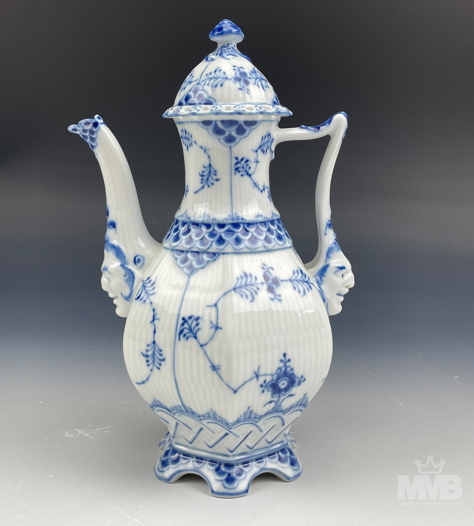 Royal Copenhagen Blue Fluted Full Lace Coffee Pot: Features a Royal Copenhagen Denmark Danish porcelain mini coffee pot with lid. Modeled in their "Blue Fluted Full Lace ( No Trim ) pattern bearing model number 1/1030. Graced with pretty blue scale an