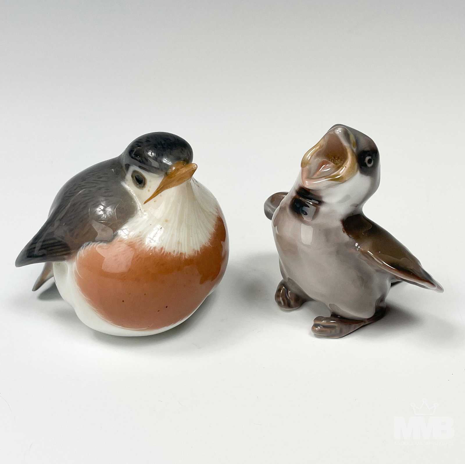 Bing Grondahl & Royal Copenhan Bird Figurines LOT: Includes the following articles. Bing & Grondahl Fledging Sparrow # 1852 designed by artist Knud Kyhn (Denmark, 1880-1969). Royal Copenhagen #2266 Robin bird figurine. Designed by artist Francis Valde