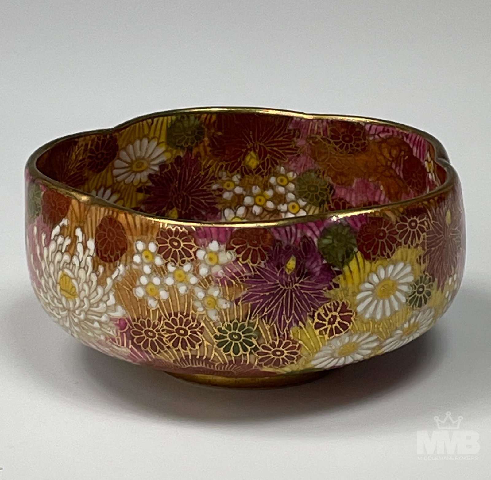 Satsuma Japanese Porcelain Floral Gold Gilt Dish: Graced with an abundance of pretty brightly colored flowers. Art work masterfully embellished with gold accents. Semi gloss finish. Good condition. Evidence of crazing. No chips, cracks or repairs. Me