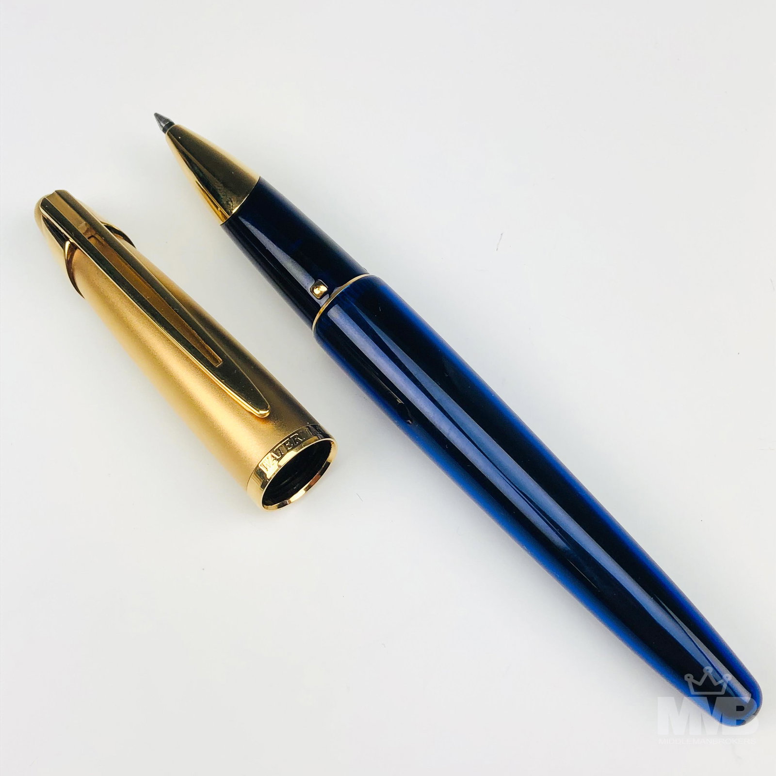 Waterman Edson Sapphire Ballpoint Desk Pen 6": Splendidly well crafted French ballpoint writing pen with a gold plated cap with unique pocket clip with cut out design. Snuggly snaps on and is held by three gold posts which appear to be part of the