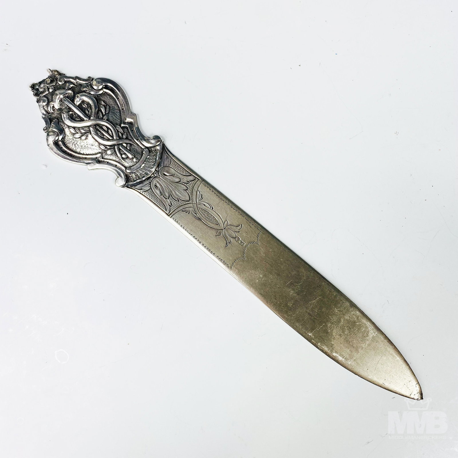 Sterling Silver 925 Caduceus Etched Letter Opener: Solid sterling envelope letter desk instrument. End of the handle graced with the mythological Greco Egyptian symbol of the caduceus which features intertwining serpents on a rod. An etched design gra