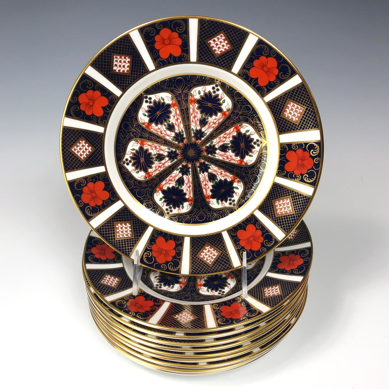Set 10 Royal Crown Derby Old Imari Salad Plates: Offered up for auction is a set of 10 English bone china salad plates. Modeled by Royal Crown Derby in their "Old Imari" pattern that was first introduced in 1901. Articles beautifully decorated in co