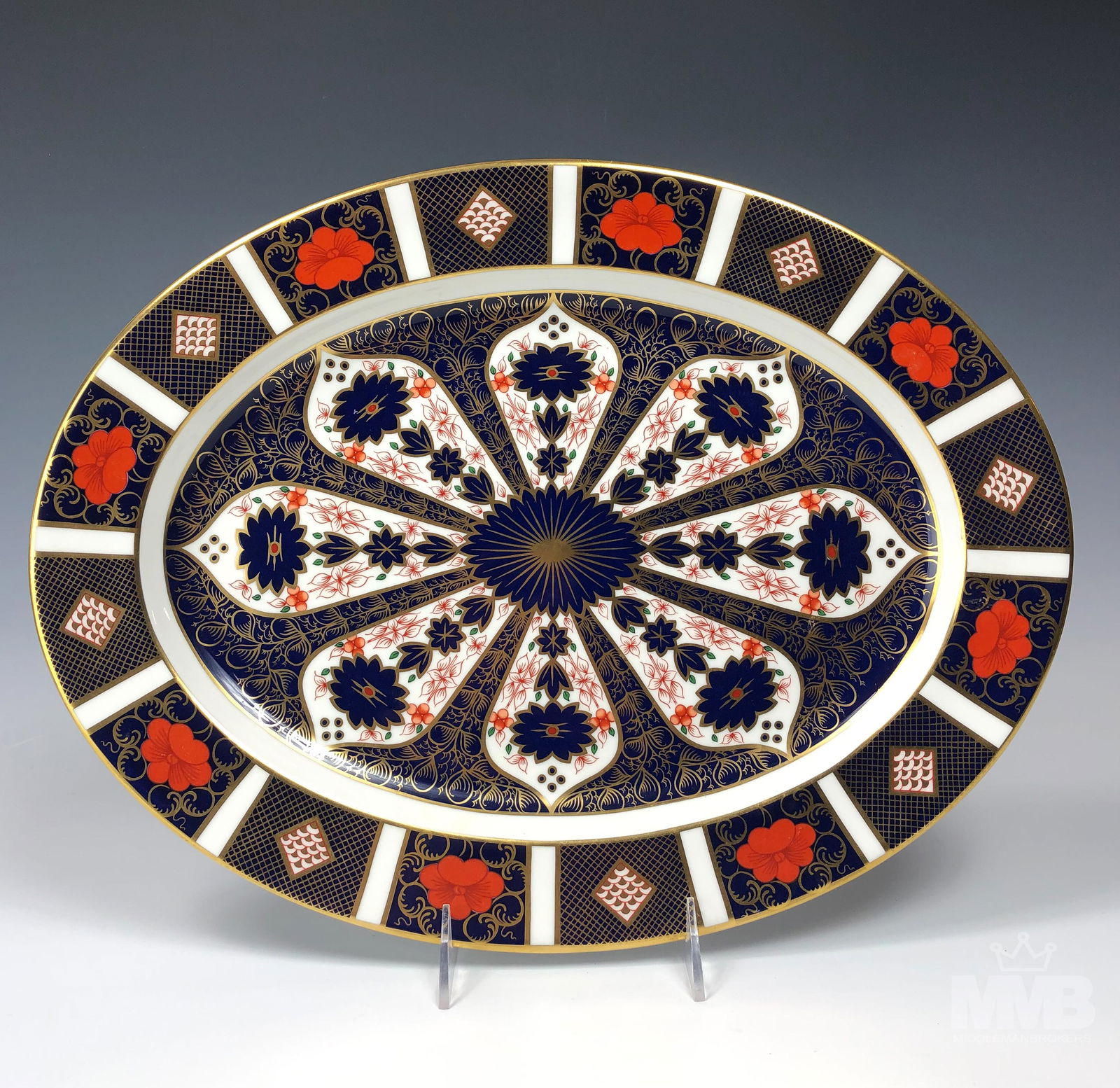 Royal Crown Derby Old Imari 16" Oval Tray Platter: Offered up for auction is an English bone china oval serving platter tray. Modeled by Royal Crown Derby in their "Old Imari" pattern that was first introduced in 1901. Articles beautifully decorated i