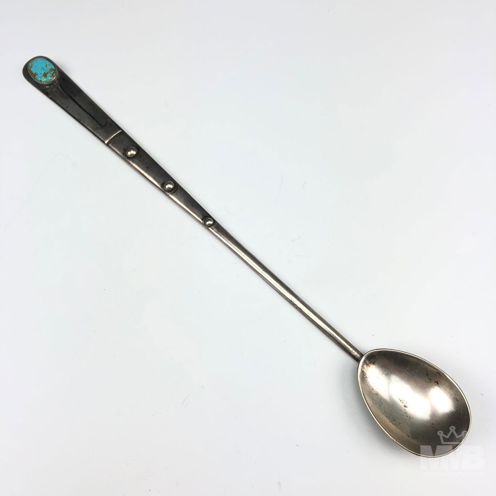 Frank Patania Sterling & Turquoise Beverage Spoon: Frank Patania ( Italian, 1899 - 1964 ) sterling silver artisan / silversmith. Painstaking hand crafted in manner with a strongly influenced Native American Indian motif. A pretty blue turquoise caboch