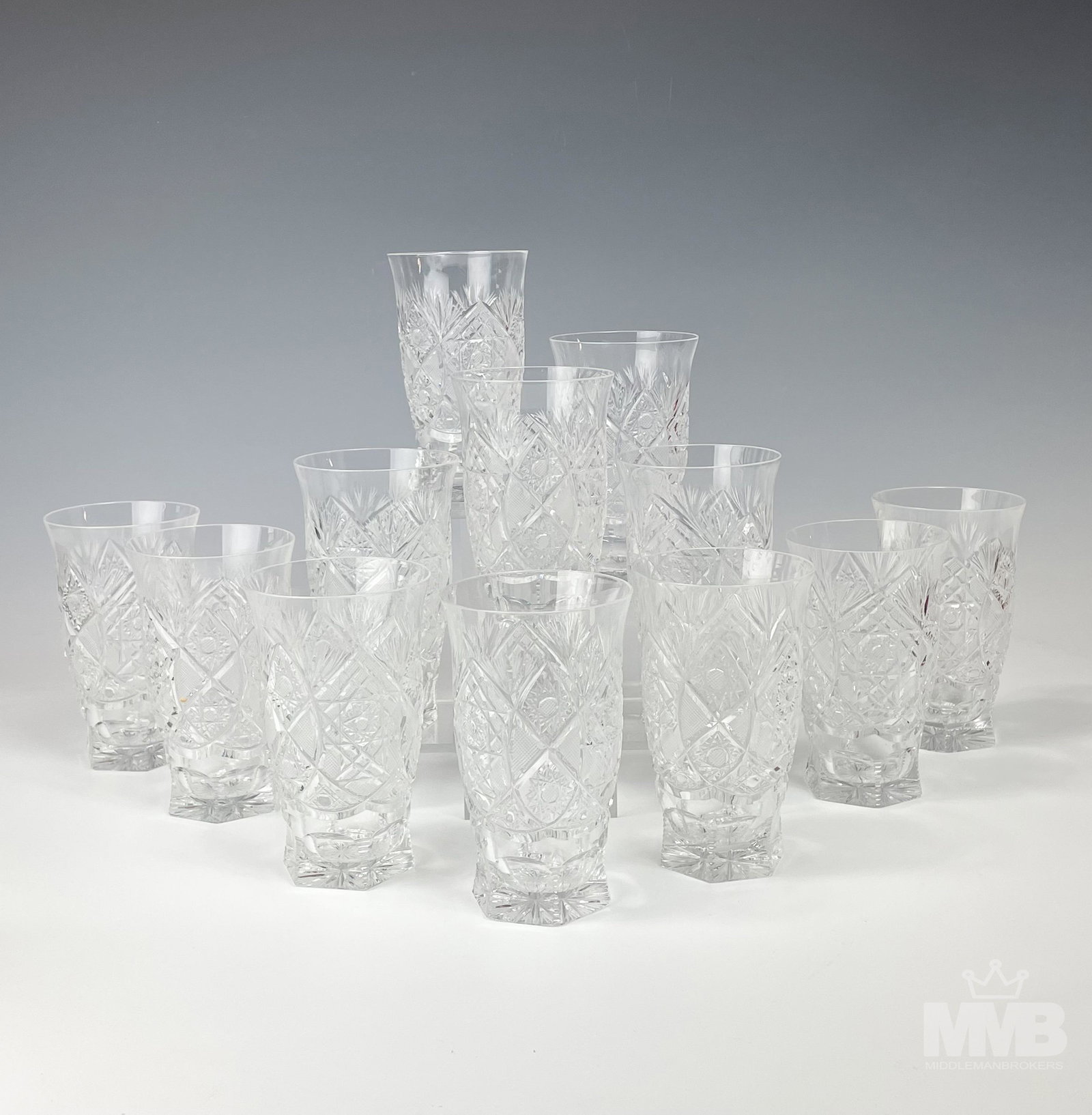 12 Mystery Maker Cut Crystal Bar Barware Tumblers: Elegant crystal stemware with nice shape to each. Graced with cut hobstars, diamond quilt, intersecting arcs and fan patterns. Bases with a panel cut and vertical saw tooth design. Starburst forms to 