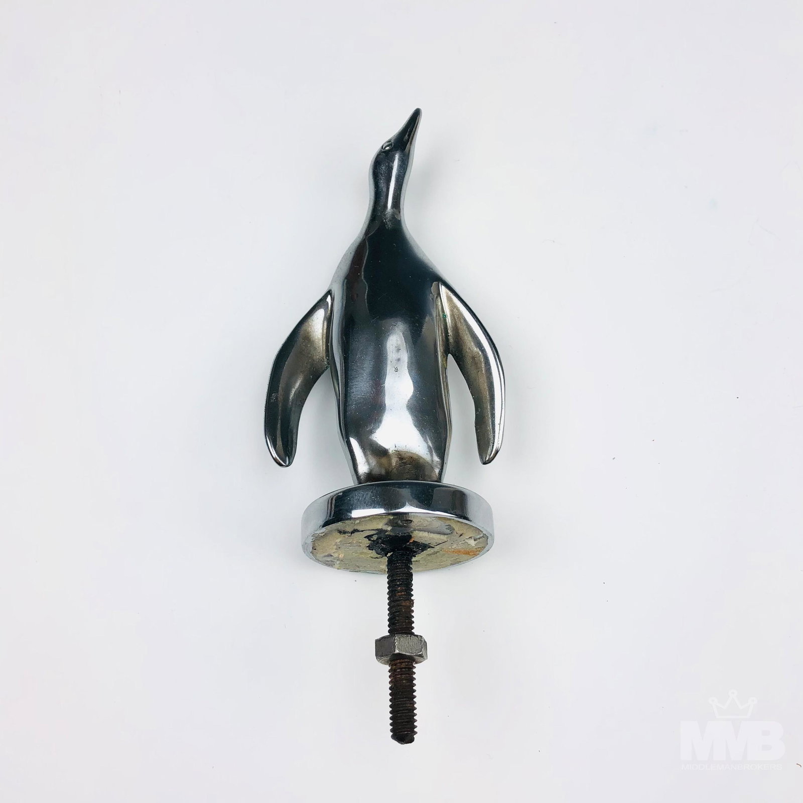 LeJeune Chrome Penguin Car Mascot Hood Ornament: Antique chrome metal hood ornament by French silversmith Emil LeJeune. Founder of the company AE Lejeune ( AEL) in 1910, London, England. In the late 1920's, the company earned the reputation of being