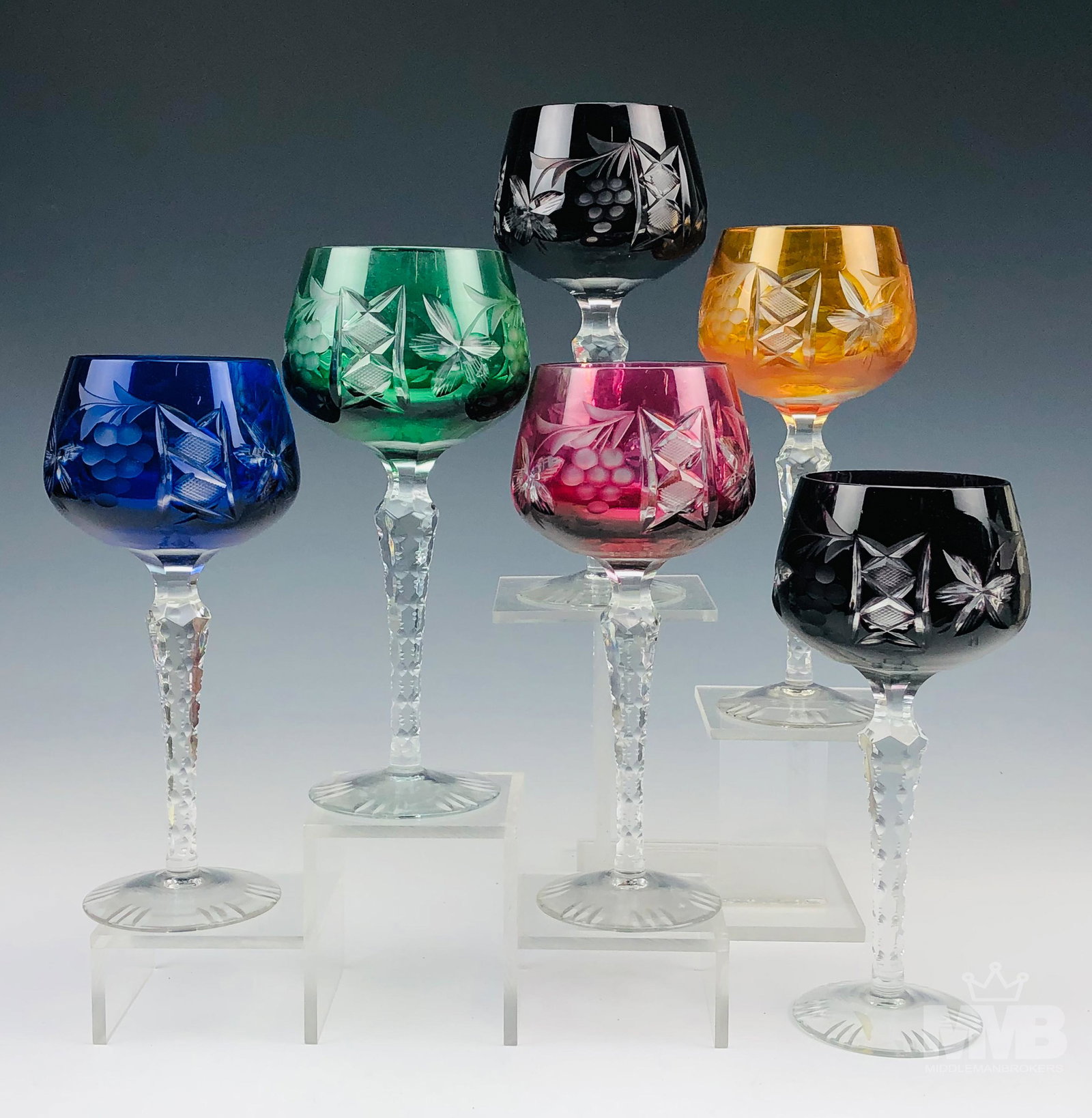 6 Ajka Hungarian Crystal Marsala Wine Bar Goblets: Offered for auction are a set of 6 Hungarian crystal stemware articles by Ajka. Modeled in their "Marsala" pattern introduced in 2004. Each graced with cut grape cluster, leaf, vine, diamond quilt and