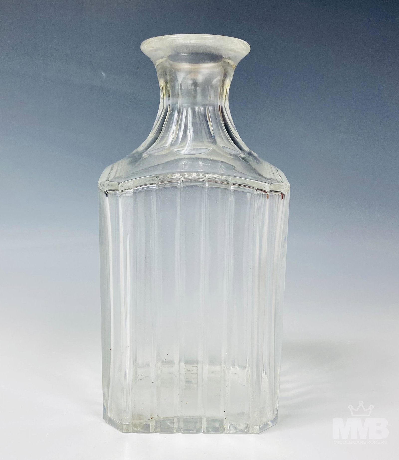 Baccarat French Crystal Liquor Alcohol 8" Decanter: Baccarat French crystal decanter. Features vertical cut lines with elongated oval design. Good overall condition with mild storage wear. Does not include stopper. Measures approximately 8 in. x 4 in. 