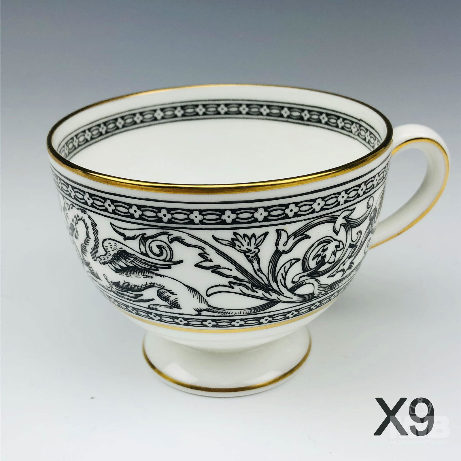 9 Wedgwood Bone China Florentine Black Tea Cups: Each graced with mythological dragons, phoenix birds and floral decorations around the border, against a crisp white ground with gold trimmed accent linings. Production years : 1959 - 1997. Glazed fin