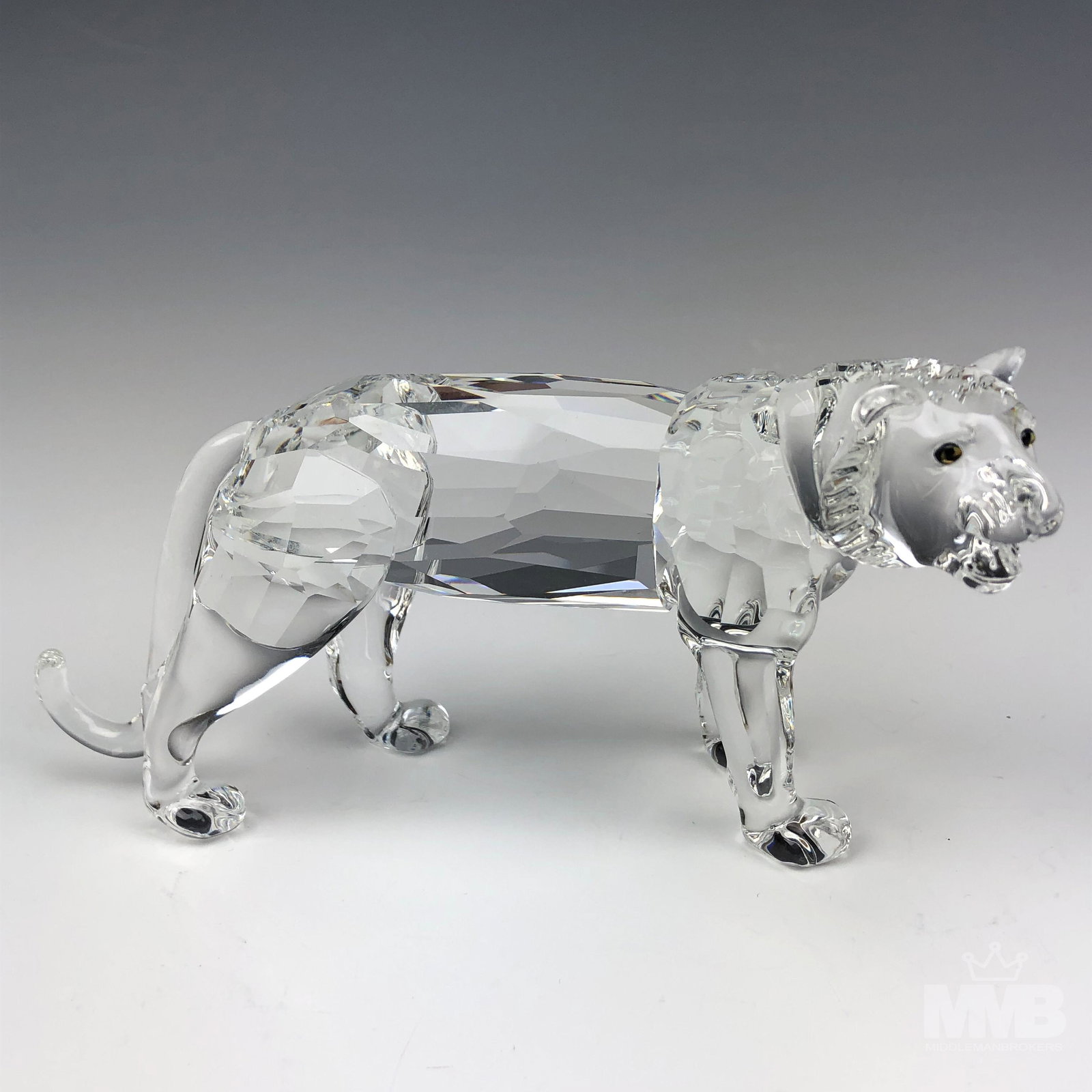 Swarovski Austrian Crystal Tiger Glass Figurine: Designed by Michael Stamey. Model number : 7610. Introduced : 1998. Retired : 2002. Part of The Endangered Species group themed collection. No box. No COA, Good estate fresh condition. No chips, crack