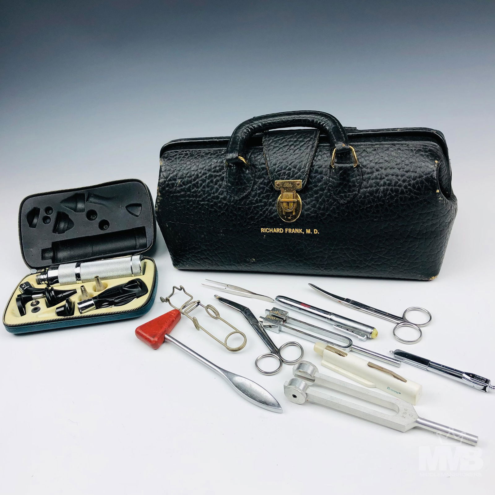 Elephant Hide Leather Doctor's Bag w/ Instruments: Antique heavy duty doctor's portable mediacl bag with gilt brass mounted hardware. Includes miscellaneous instruments. Circa 1930's. Monogramed with the name Richard Frank, M.D. Estate fresh condition