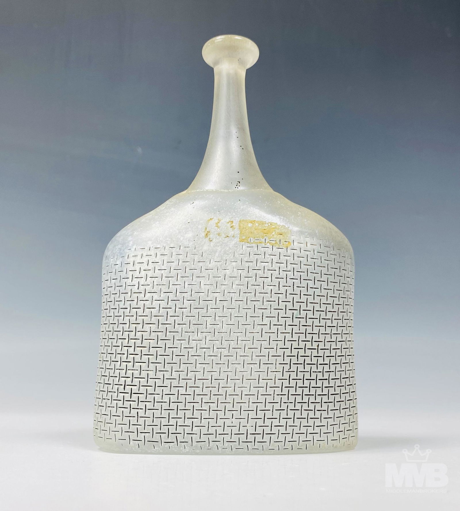 Kosta Boda Bertil Vallien Glass Satellite Bottle: Art Glass bud vase by Kosta Boda. Crafted of fine quality Swedish art glass. Designed by Bertil Vallien. Satellite bottle design with woven fabric like decoration. Good overall condition with mild sto