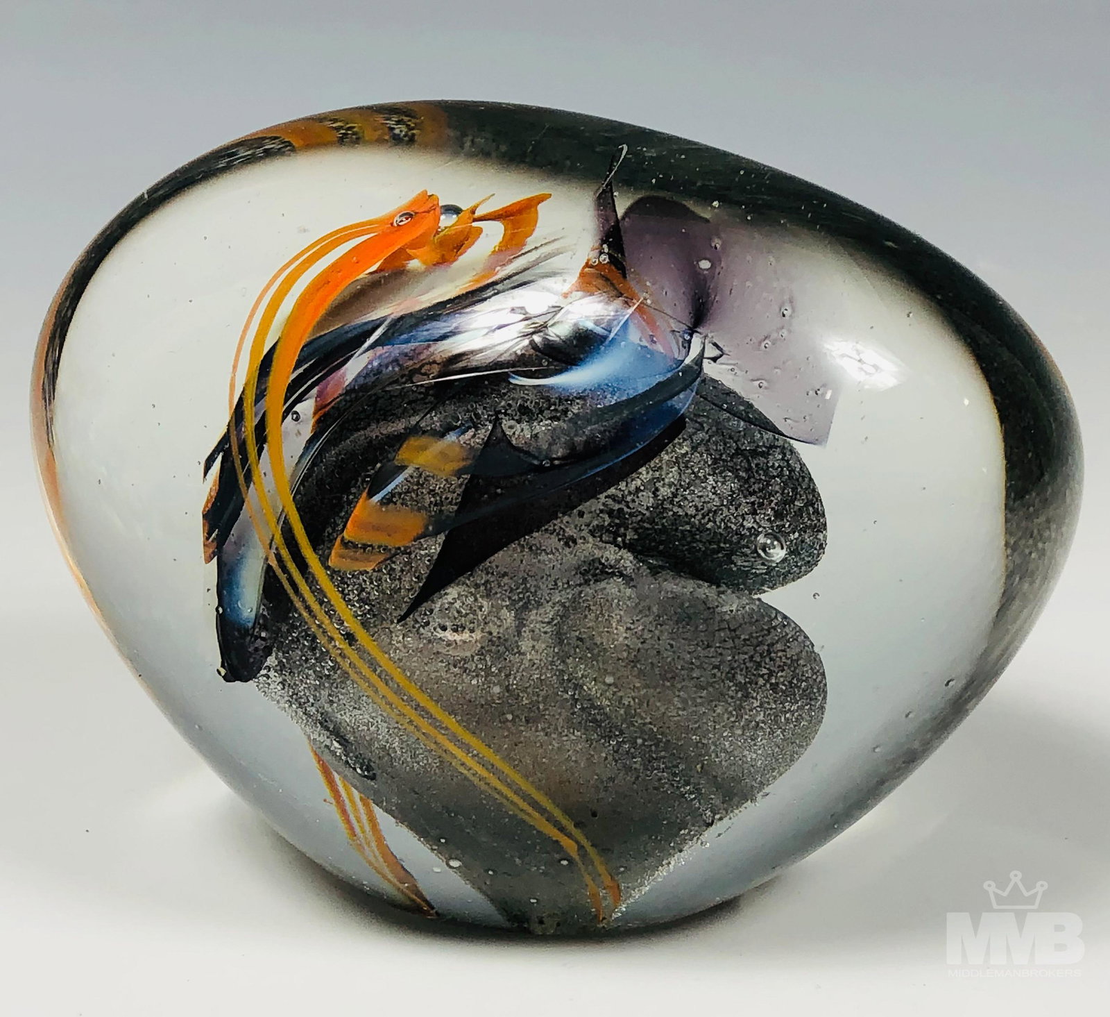 Sharon Fujimoto Art Glass Abstract Paperweight: Sharon Fujimoto (20th century). Abstract art glass paperweight with an orange and grey color palette. SHIPPING MMB will offer in-house continental USA shipping for $25 plus insurance. Gallery will ref