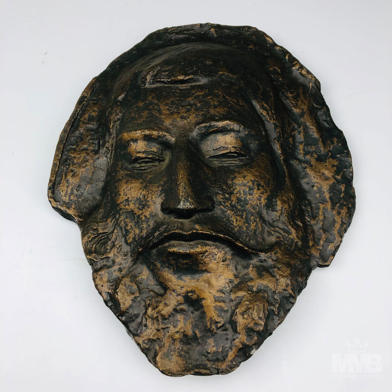 Bronzed Wall Sculptural Death Mask of Paul Gauguin: Classical style sculpted face of Paul Gauguin (1848 - 1903, France), in bronzed plaster. The piece has a mount on the back to hang on a wall and has an artists mark on the bottom edge. SHIPPING MMB wi