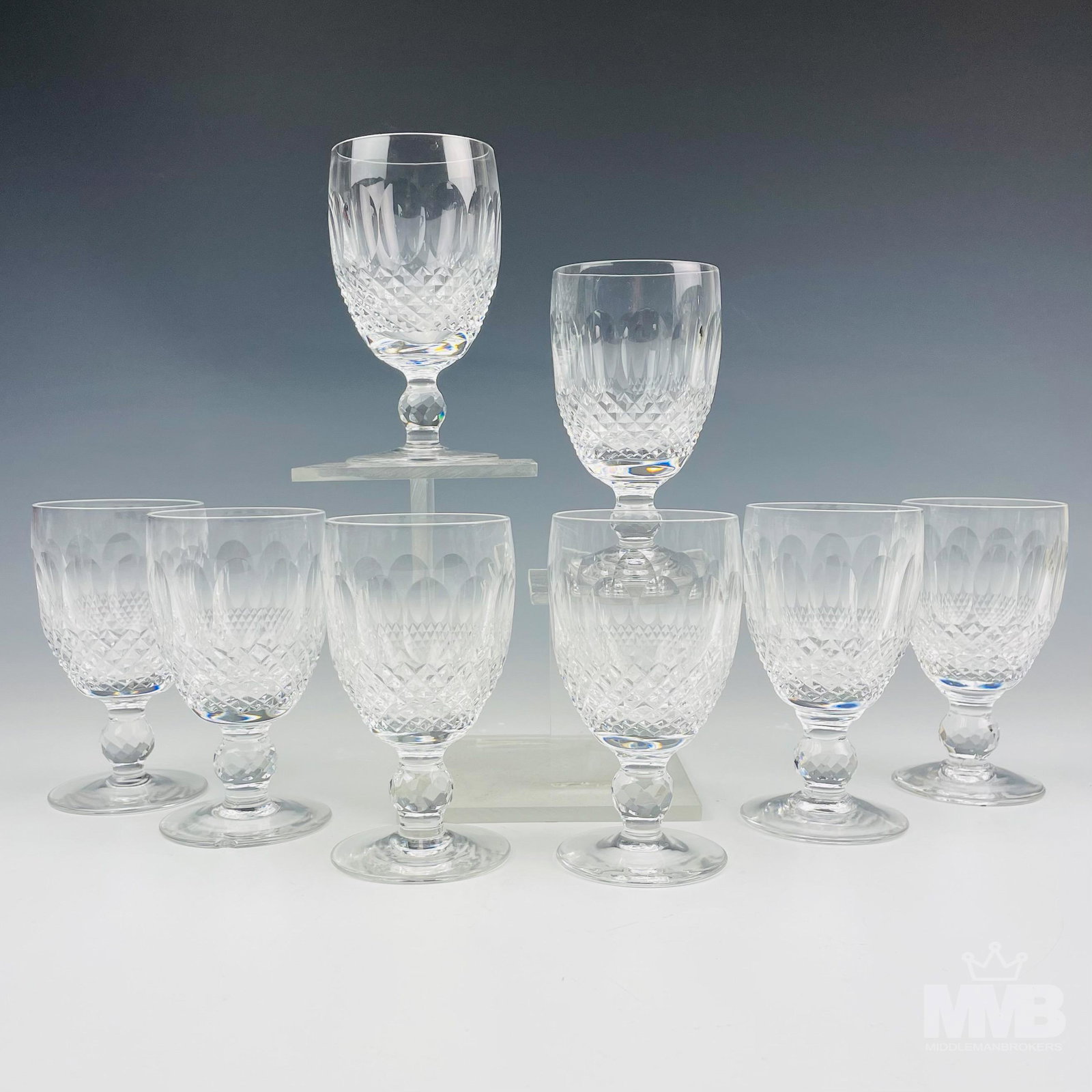 8 Waterford Crystal Colleen Claret Wine Goblets: Design features vertical oval cuts over a diamond quilted pattern, around the body. Short rounded multifaceted stem over clear circular footed base. Production years : 1968 - 2018. Sparkling crystal c