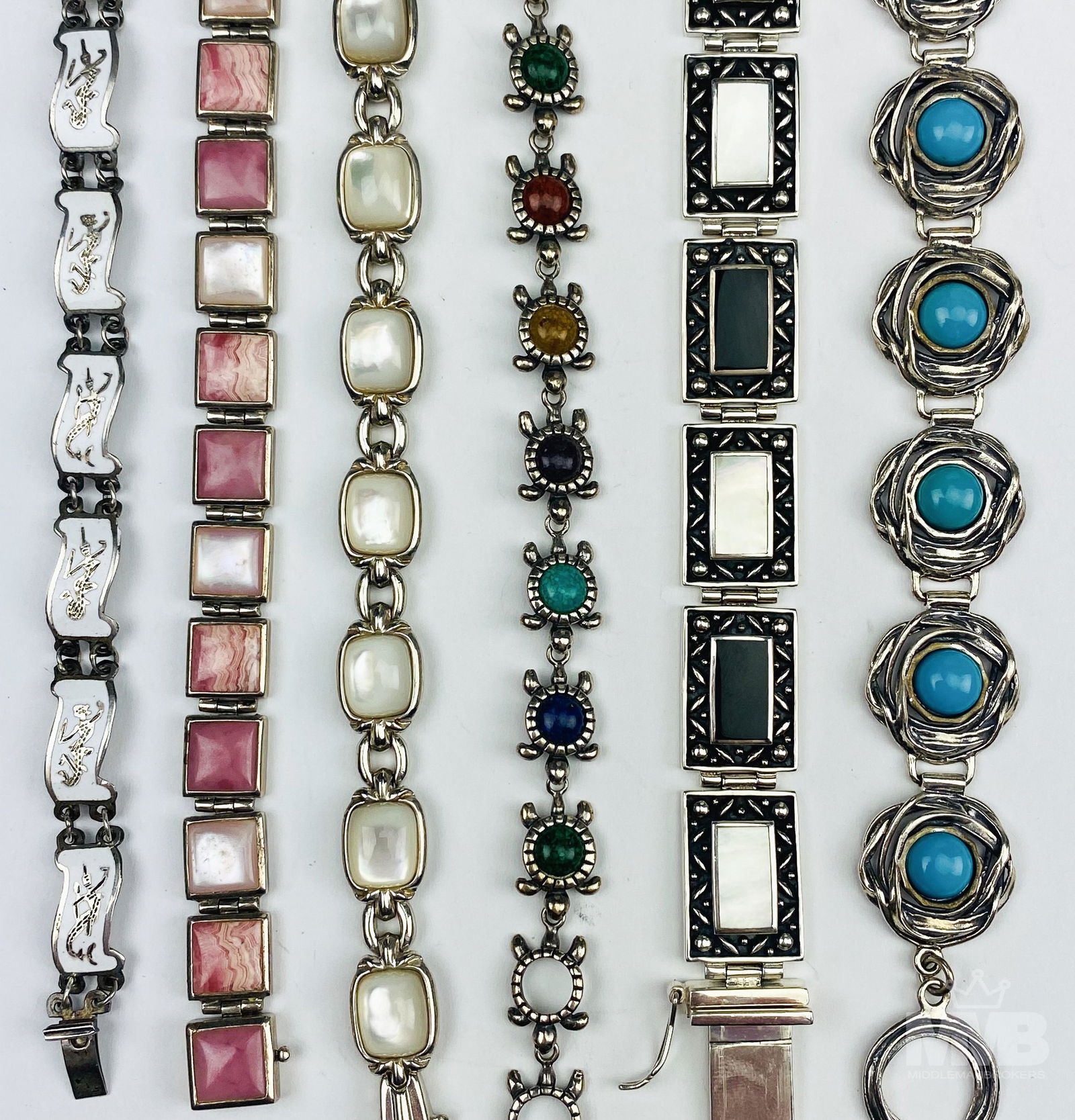 6 Sterling Silver & Gemstone Enamel Link Bracelets: 3 of the 6 bracelets incorporated with semi precious hardstones. 1 with mother of pearl. 1 x pink jasper and mother of pearl. 1 with white enamel. No monograms. Original patina. Toggle and open mouth