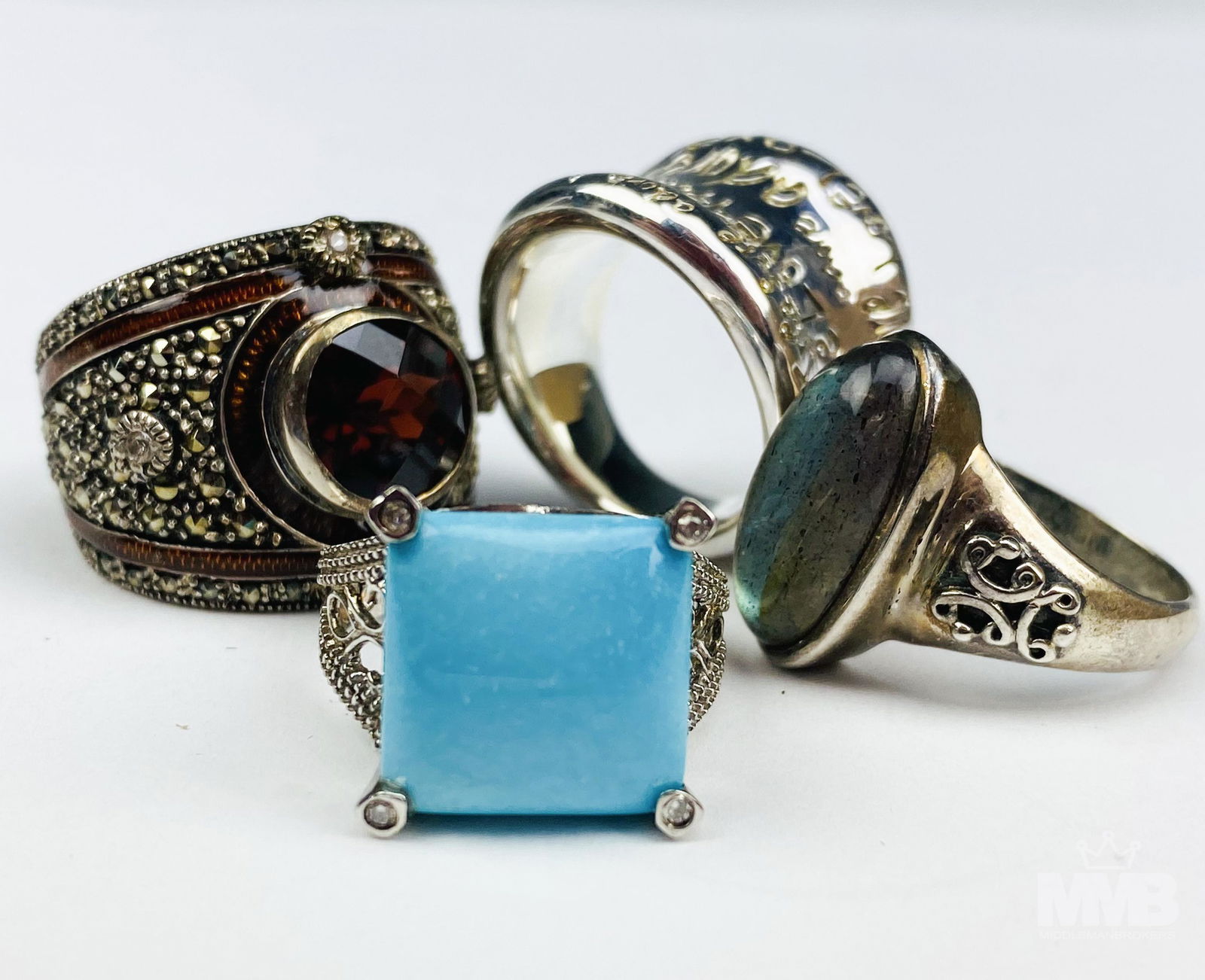 Estate Collection 4 Sterling Silver Gemstone Rings: Names include ~ 1 x RLM ( Robert Lee Morris ) ~ ring with the Love, Treasure Adore ~ size 5. 1 x DP Thailand MLD ( garnet and marcasite ~ size 6. 1 x blue stone stamped China ~ size 5. 1 x abalone she