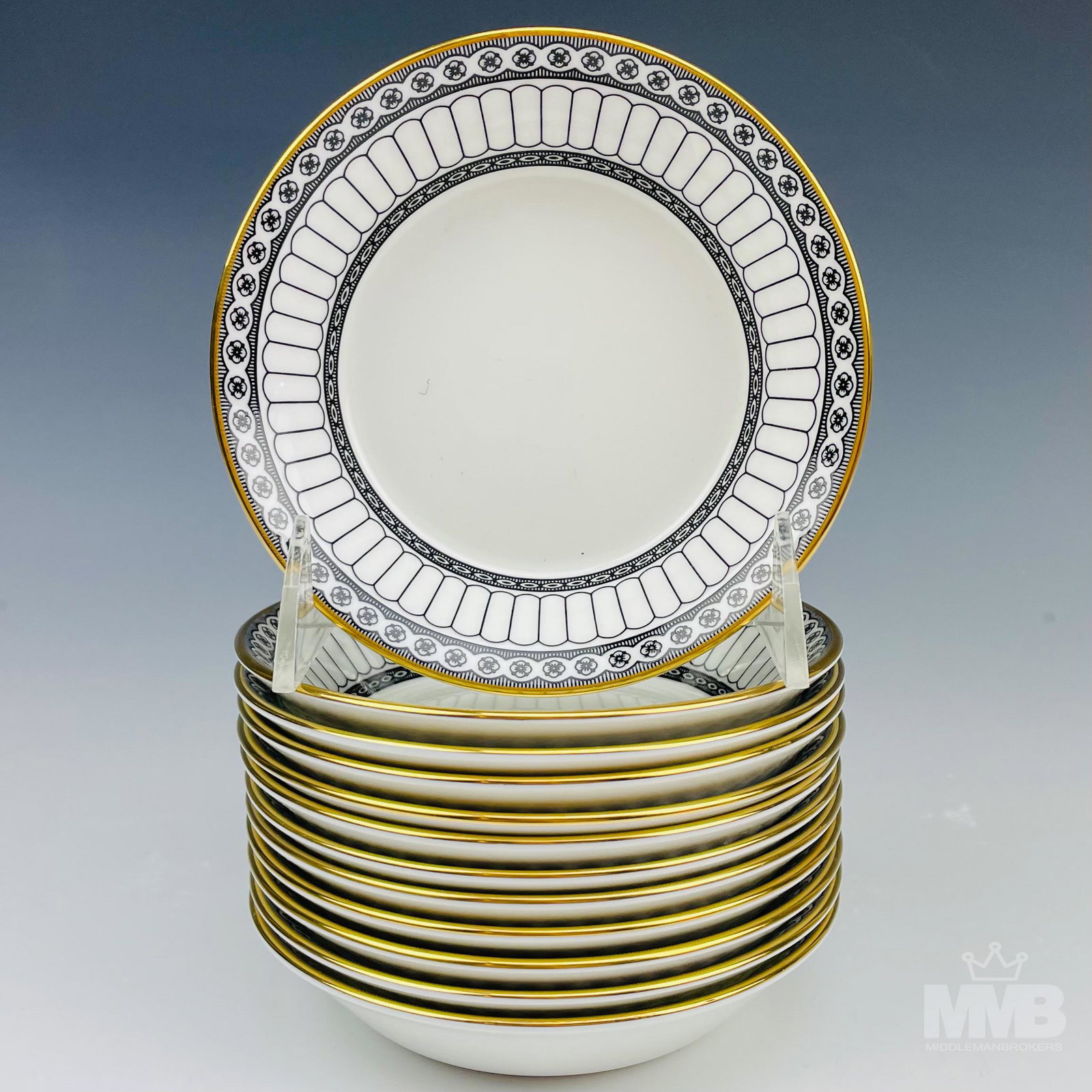 12 Wedgwood Black Colonnade 5" Fruit Dessert Bowls: Design features black geometric lines and floral rosette forms around the rims, the borders with a rich gold trim lining. Production years : 1960 - 2004. Glazed finish . Signed with the black urn hall