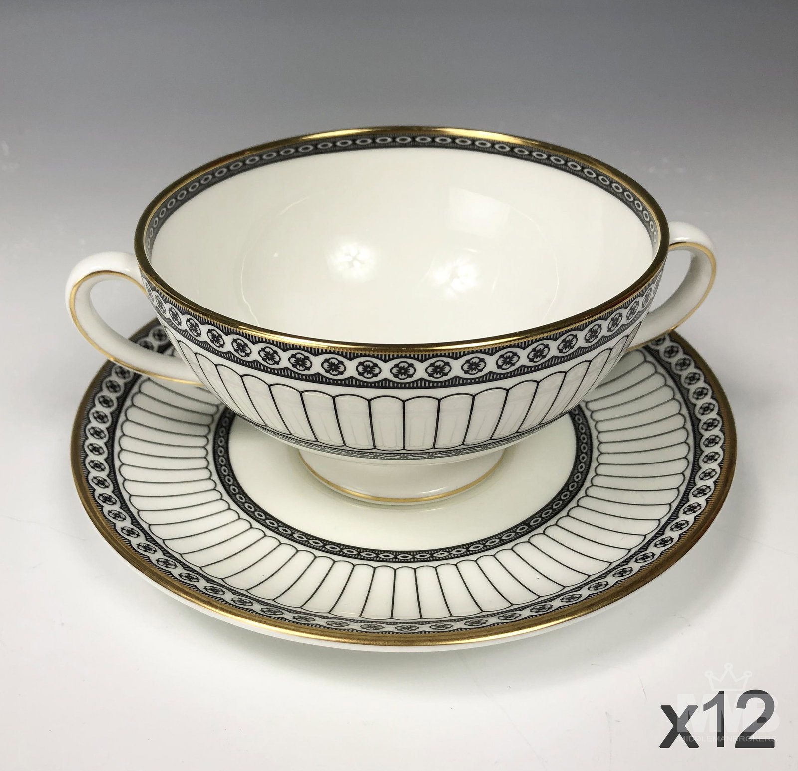 12 Wedgwood Black Colonnade Cream Soup Bowl Saucer: Design features black geometric lines and floral rosette forms around the rims, the borders with a rich gold trim lining. Production years : 1960 - 2004. Glazed finish. Bowls measure 2 1/2 in. x 4 1/2