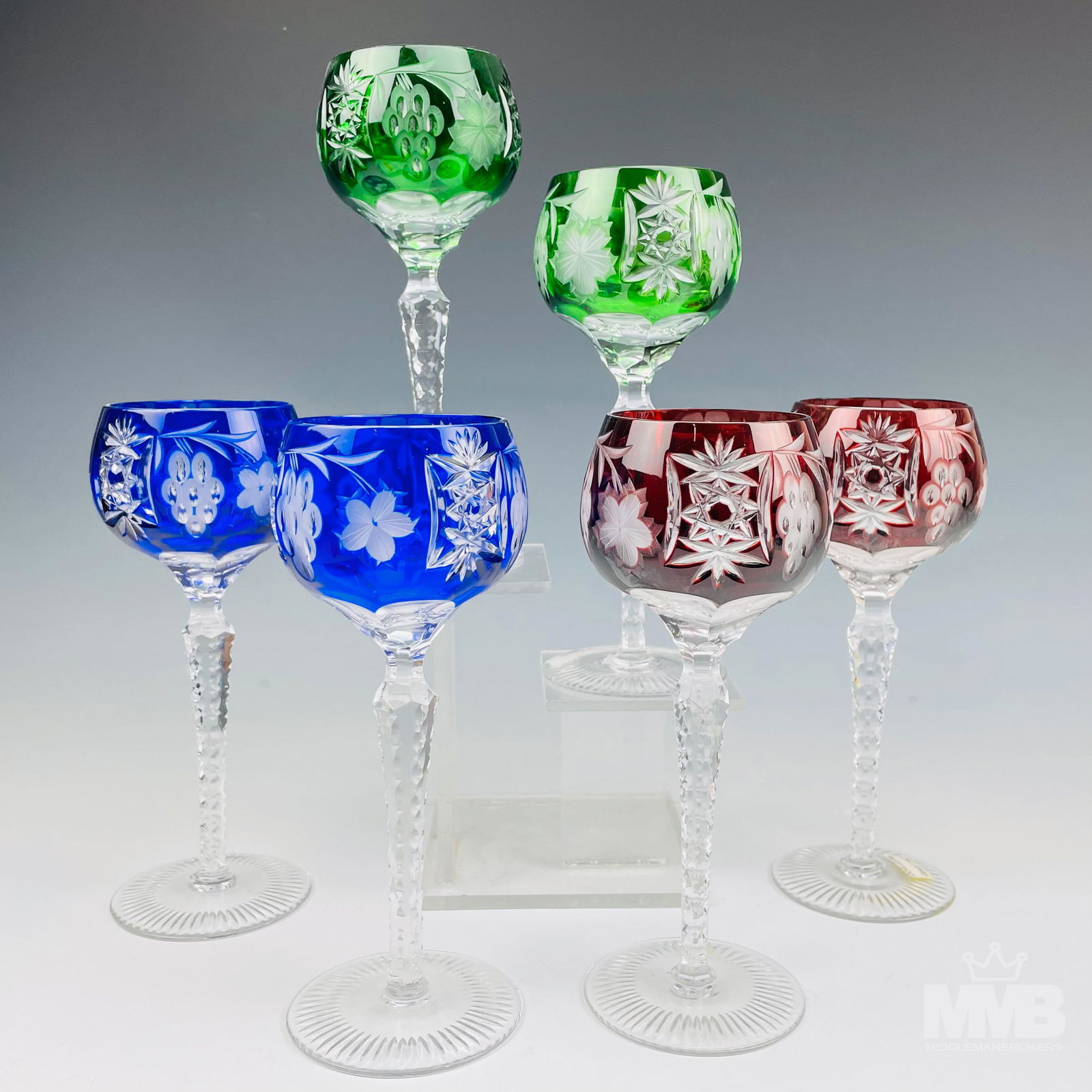 6 Ajka Cut Crystal Marsala Bar Barware Wine Goblet: Hungarian origin cut to clear crystal bar barware wine drinking glass goblets. Includes2 x blue, 2 x ruby red and 2 x emerald green. Pattern : Ajka. Introduced in 2004. Feature cut grape cluster, fan,