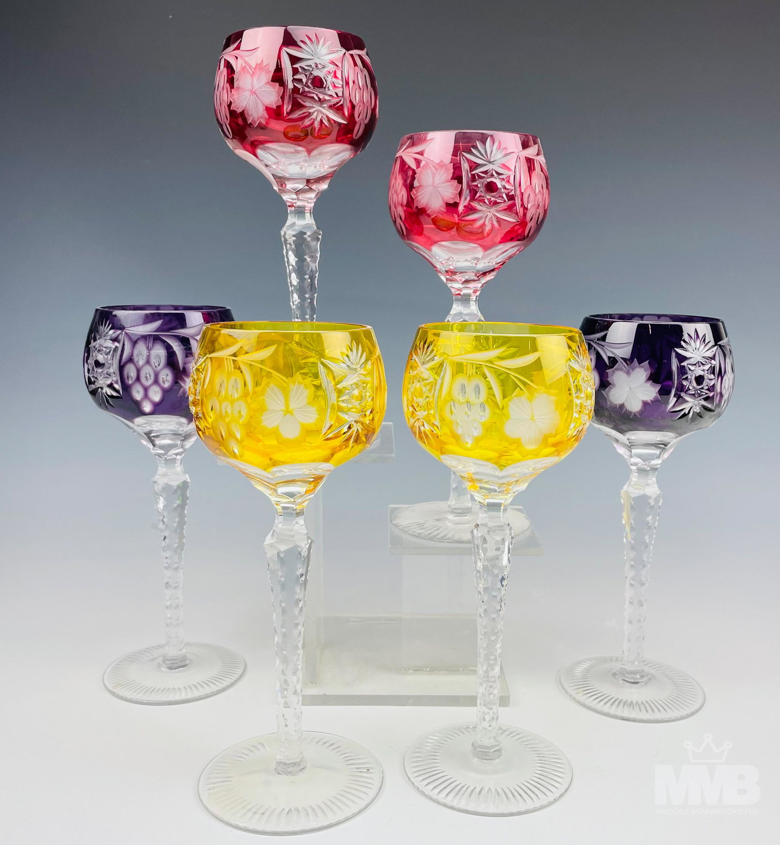 6 Ajka Cut Crystal Marsala Bar Barware Wine Goblet: Hungarian origin cut to clear crystal bar barware wine drinking glass goblets. Includes 2 x gold amber, 2 x ruby cranberry and 2 x amethyst. Pattern : Ajka. Introduced in 2004. Feature cut grape clust