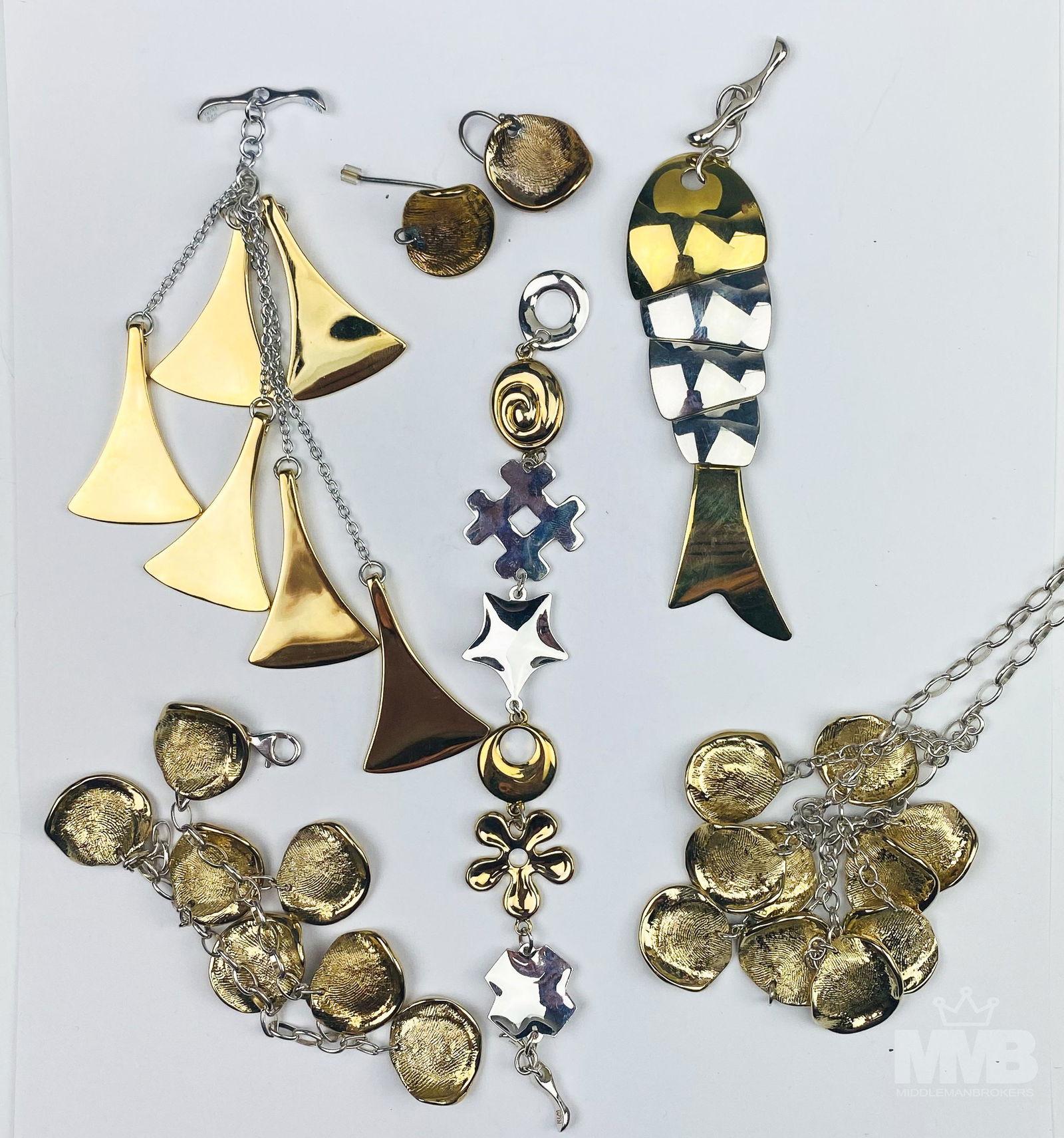 Gold Silvertone Designer Pendant Bracelet Necklace: Includes the following brass, gold and silver tone jewelry articles. 1 x RLM (Robert Lee Morris ) studio Pendant. 1 x RLM fish pendant. 1 x RLM bracelet. 1 x pair of bronze gold tone pierced earrings.