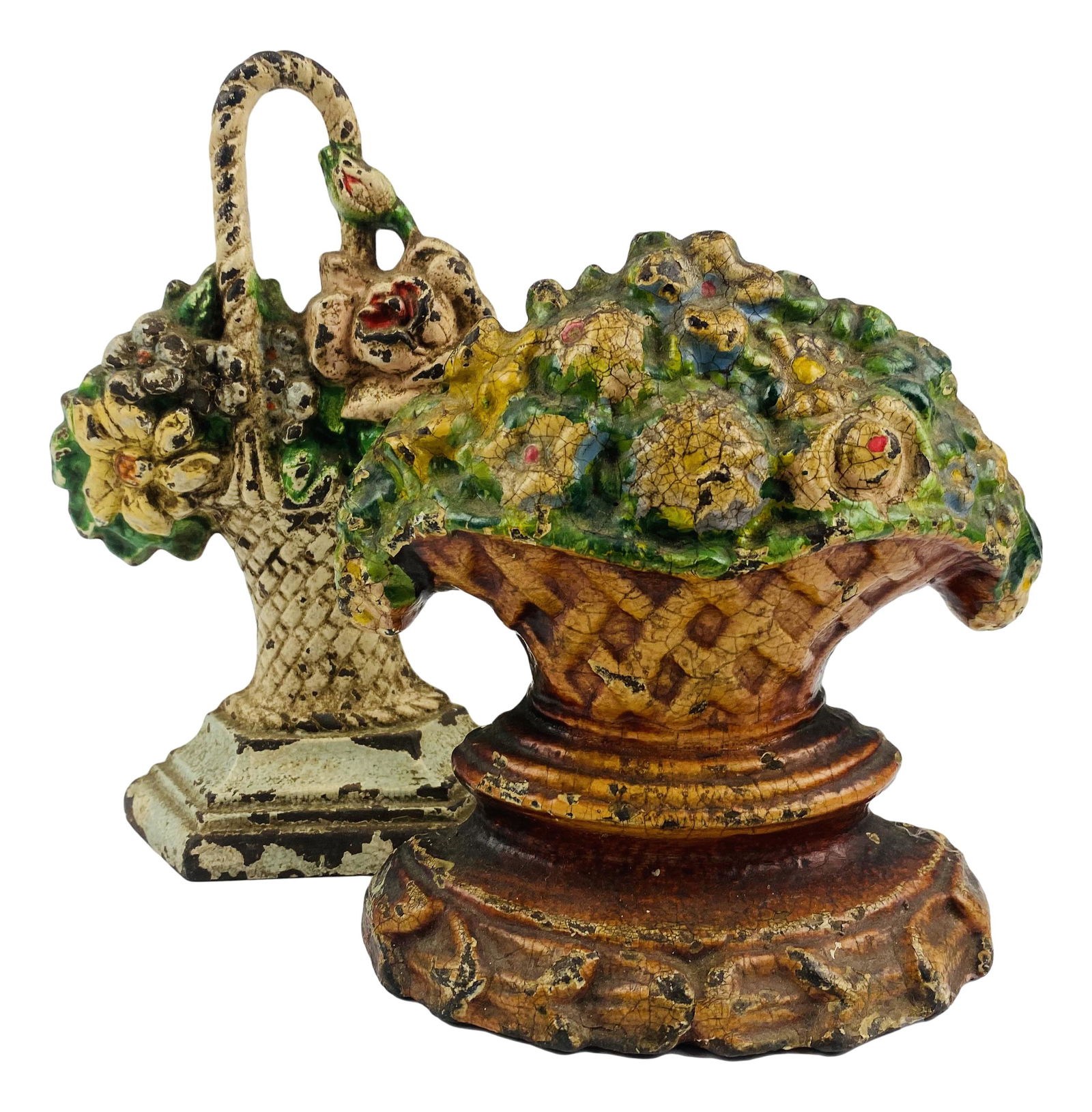 2 Old Cast Iron Basket of Flowers Doorstops: Cast iron door stop lot of two. Lot includes (1) Hubley basket of flowers measuring 7.5" x 4.5" x 2"; Inventory number 152; and (1) basket of flowers measuring 6" x 6.5" x 2". No apparent markings, be