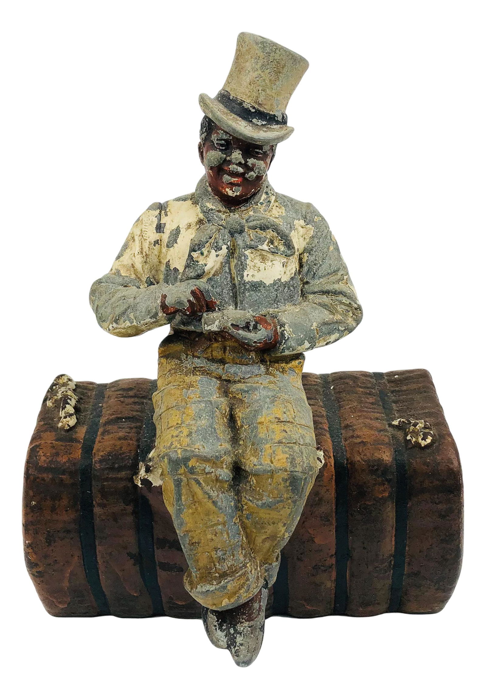 Old Black Man on Cotton Bale Cast Iron Doorstop (1 of 3)