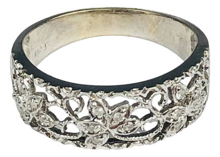 14K White Gold Diamond Cocktail Ring Size 8: Design features a pierced scroll and flower pattern embellished with diamonds. Ring size 8. Signed P 14K. Total weight : 3.4 grams. Condition: Good overall condition having average surface wear.