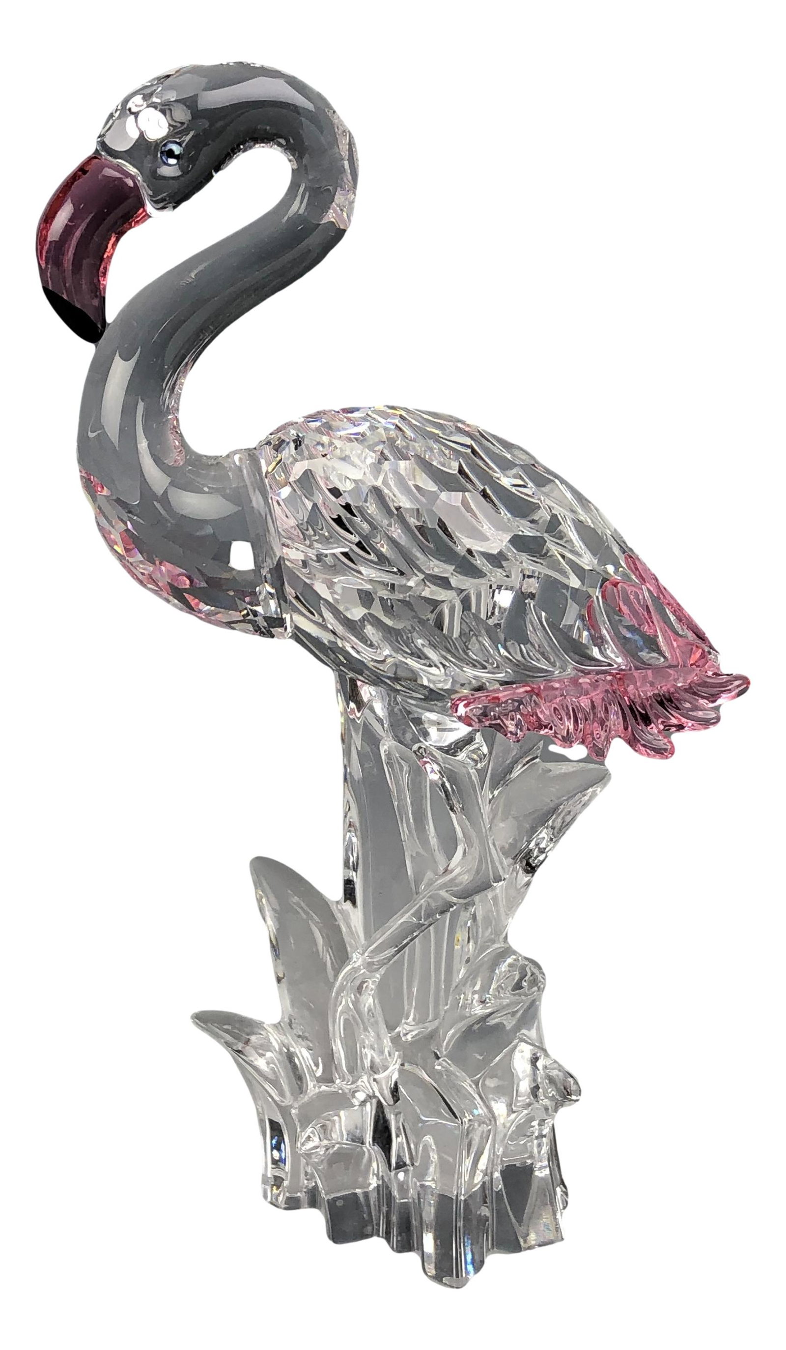 Swarovski Austrian Crystal Flamingo #7670 Figurine: Designed by Gabriele Stamey. Production years : 2002 - 2011. Part of the "Feathered Beauties" group themed series. Features this elegant flamingo with faceted clear crystal body, smooth neck, feathers