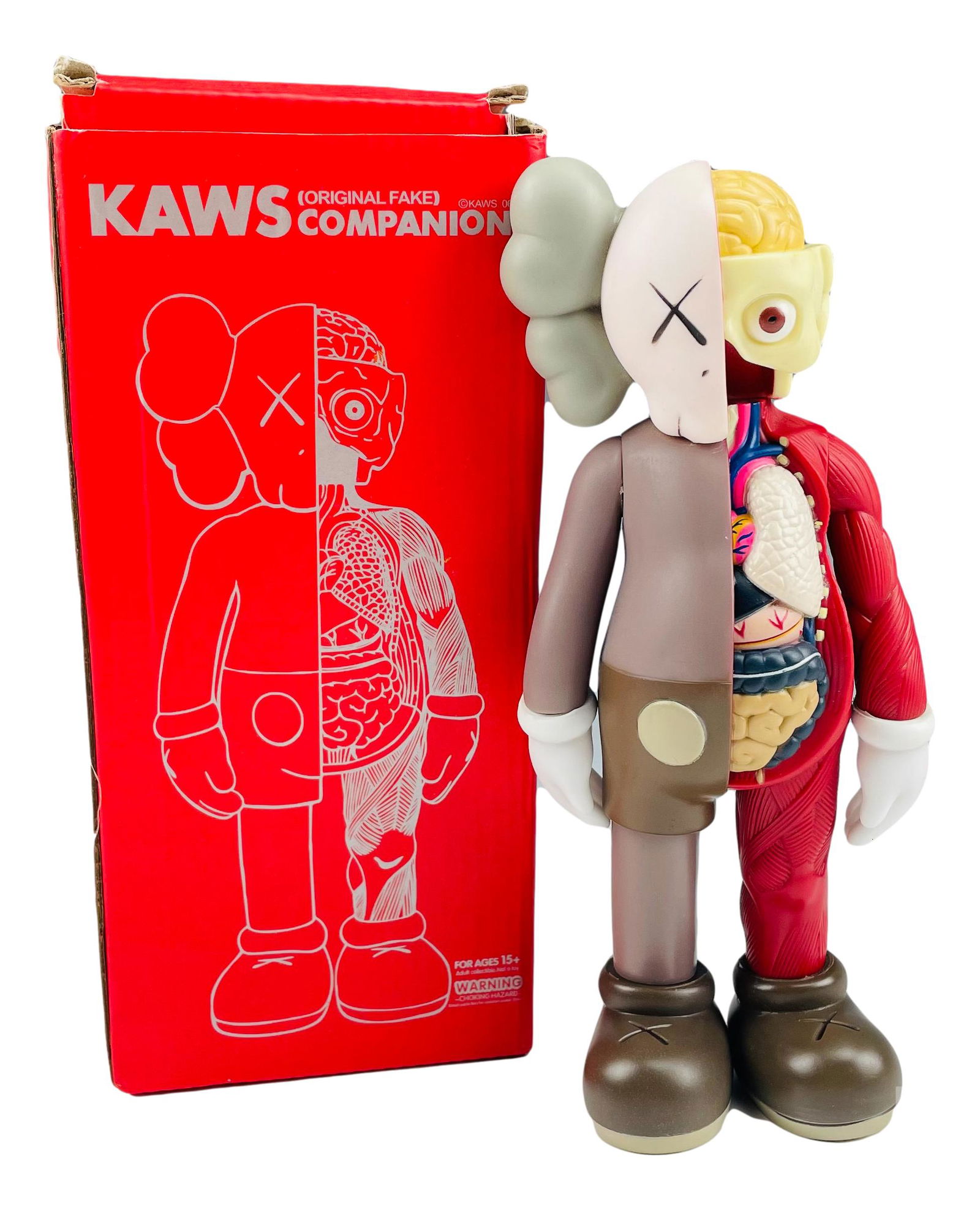 Companion 8" Vinyl Figurine Sculpture after Kaws: Replica KAWS Medicom toy. Features figure in a standing position with its inside organs showing on one side. Marked on bottom "KAWS 16" Open Edition Medicom Toy China.Dimensions: 8 X 3 X 2 in. Conditi