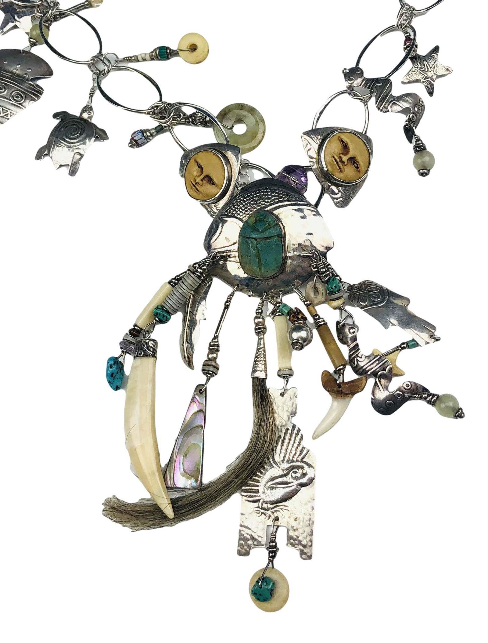 Robert Lee Morris Sterling Charm Designer Necklace: Robert Lee Morris ( American, born 1947 - ) celebrated jewelry designer and sculptor. Entire necklace features an assortment of suspended charms accented with various materials, a pendant suspended fr