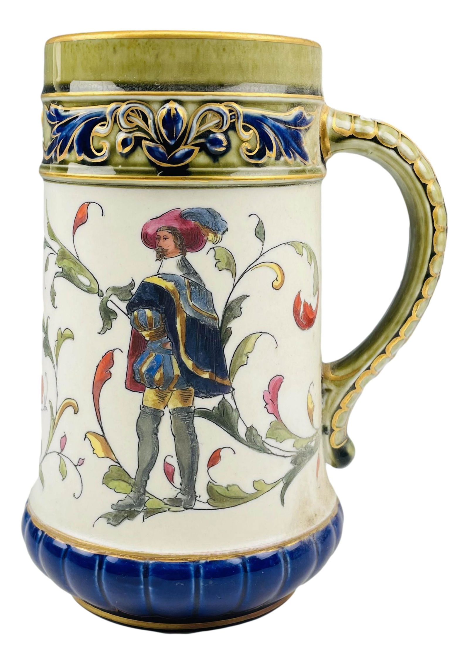 Rorstrand Sweden Engraved Musketeer Beer Stein Mug: Swedish hand painted porcelain beer stein mug with an engraved Musketeer and floral decorations against an off white ground. Raised relief decoration around the mouth and base, a segmented pattern to