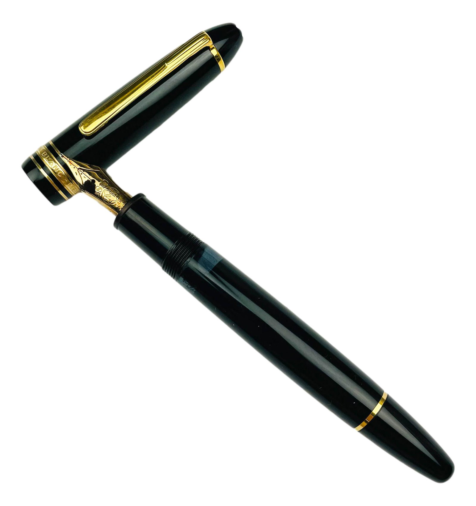 Montblanc Meisterstuck # 146 Fountain Pen 14K Nib: Graced with a black resin cap and barrel with gold tone furnishings. Sports a 14K yellow gold nib with the number 4810 with logo below. Measures 5 5/8". Uncapped 4 7/8" Posted 6 1/4". Weighs 23.4 gram