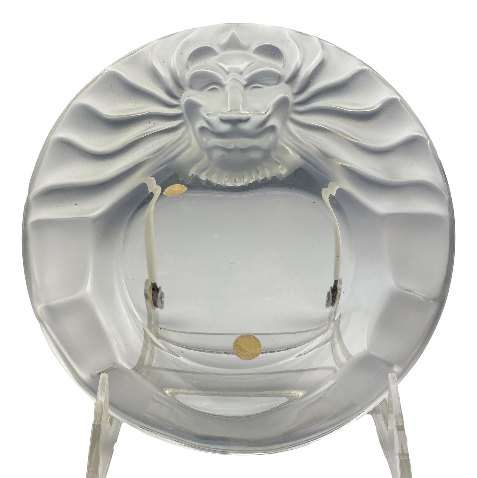 Lalique Lions Head French Art Glass Ashtray Dish: Signed Lalique trinket, ashtray or dish. Crafted of fine quality French art glass crystal. Features lions head art deco stylized design in frosted and polished crystal. Signed Lalique France. Good ove