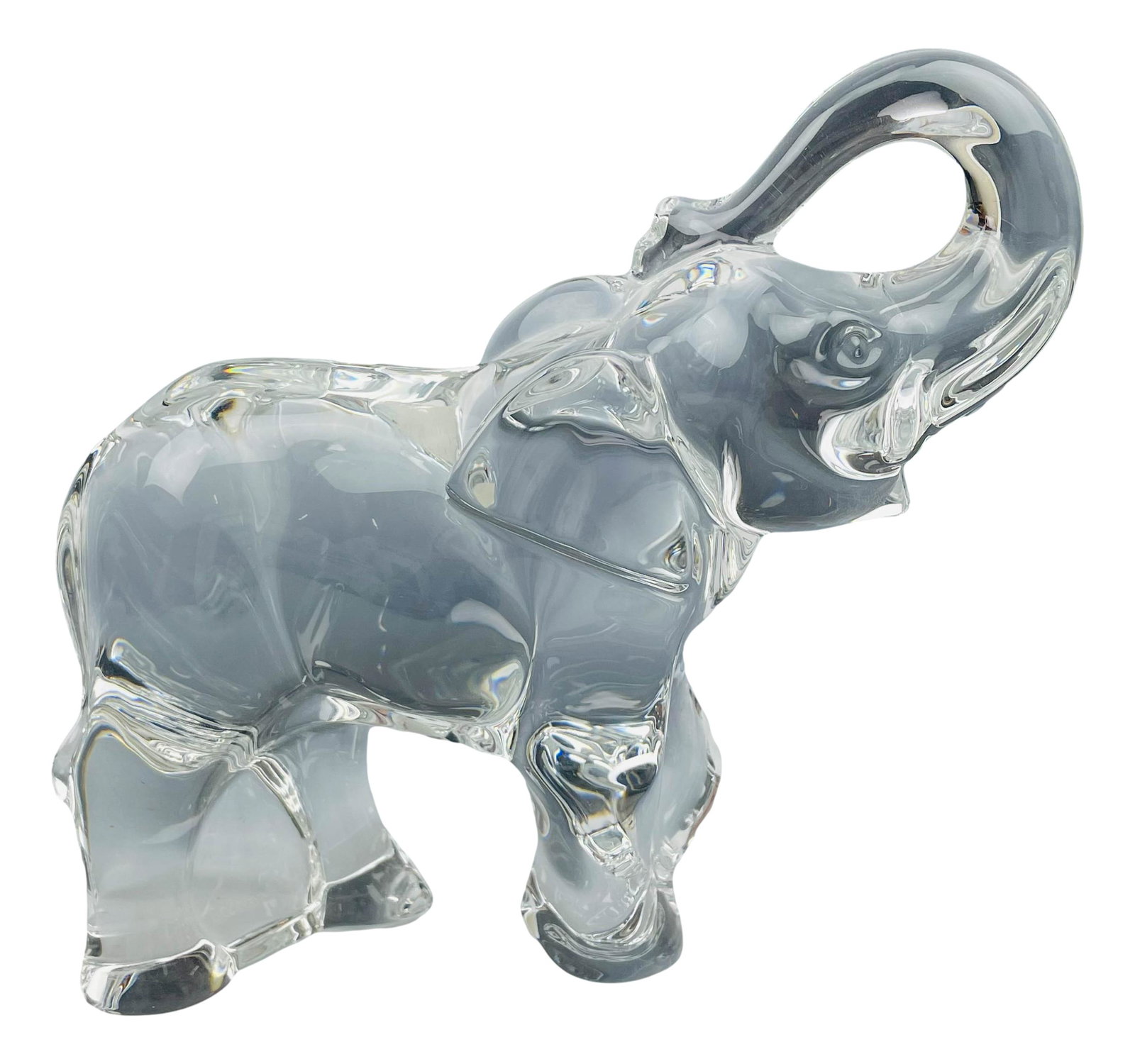 Baccarat French Crystal Glass Elephant Figurine: French clear crystal art glass animal figurine featuring and elephant in standing pose with raised trunk up. Sparkling crystal clear clarity. Smooth high mirror polished finish. Measures 6 1/2" x 6 3/