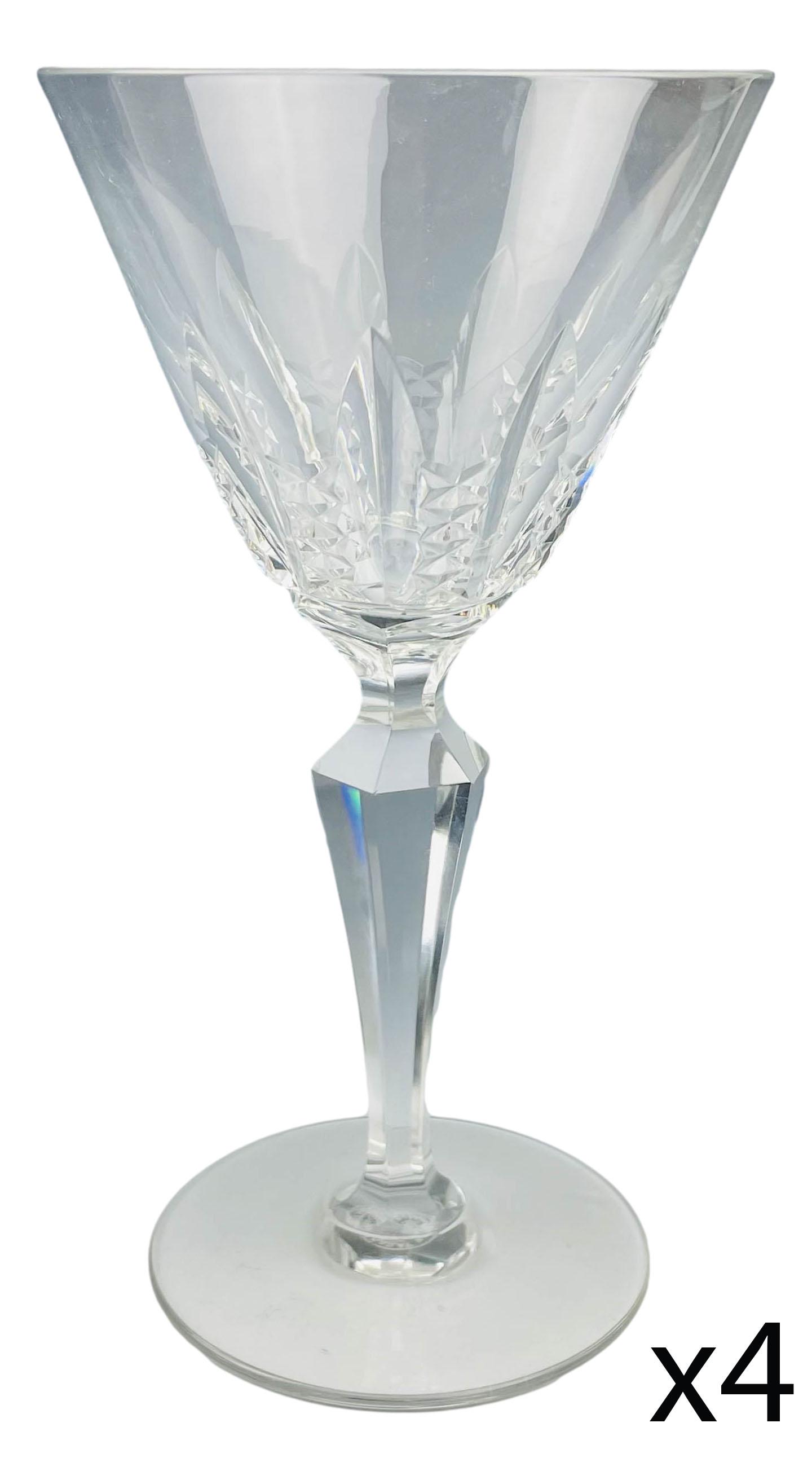 Baccarat French Crystal Austerlitz 4 Water Goblets: Pattern : Austerlitz. Production years : 1958 - 9178. Design features vertical cuts alternating with vertical cross hatch design. Multifaceted tapered stem over clear spreading circular base. Measure 