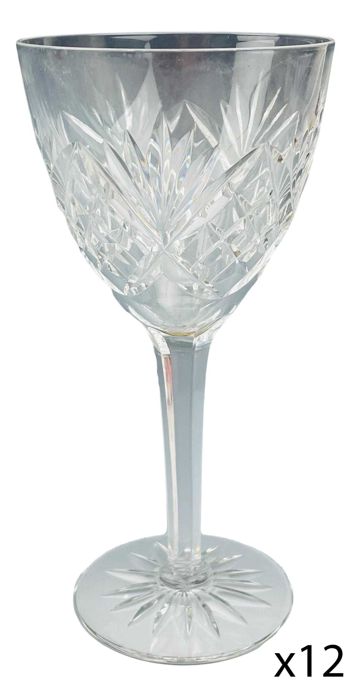 Kosta Boda Crystal Helga 7" Water Goblet 12pc LOT: Mid century modern Swedish cut crystal water drinking glass goblets modeled in the Helga" pattern. Circa 1965. Design features fan shapes alternating with a diamond quilted pattern. Multifaceted stem 