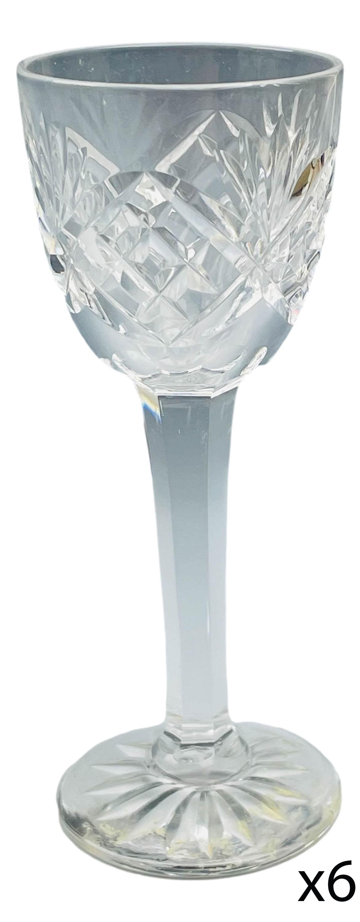 Kosta Boda Cut Crystal Helga Cordial Glass 6pc LOT: Mid century modern Swedish cut crystal water drinking glass goblets modeled in the Helga" pattern. Circa 1965. Design features fan shapes alternating with a diamond quilted pattern. Multifaceted stem 