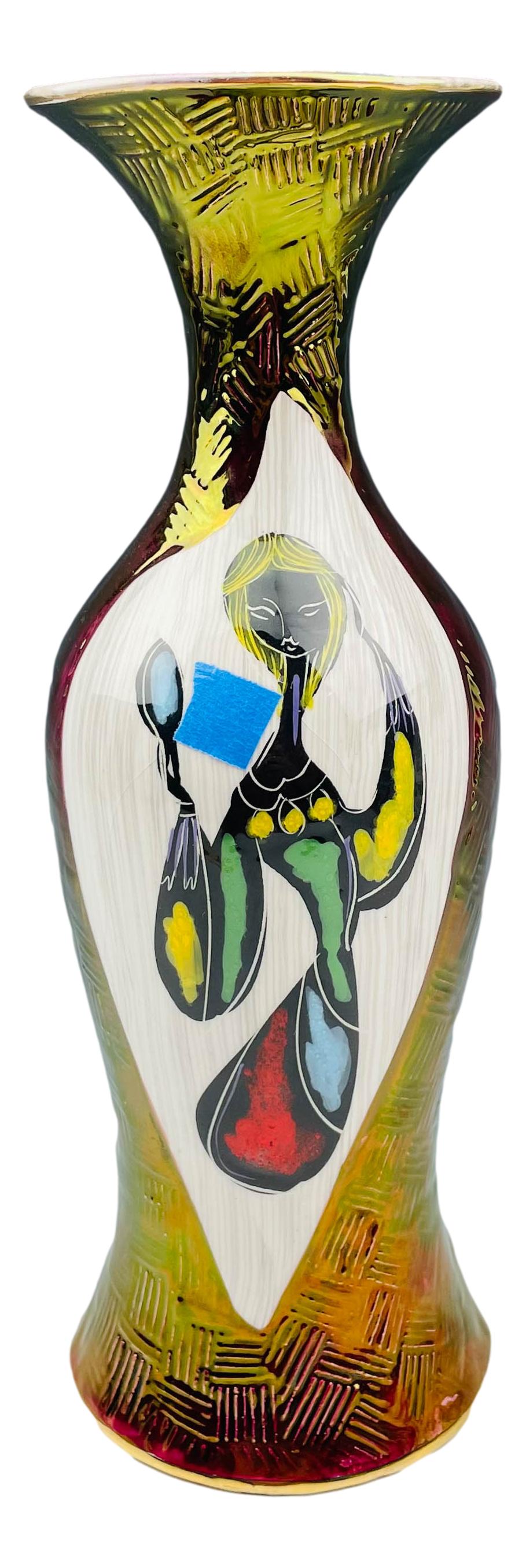 Mid Century Modern Italian Figural Ceramic Vase: Of simple form with open mouth over low sloped shouldered tapered body. One side features a young girl holding a hand mirror against a grey white ground against a blood red iridized ground with incise